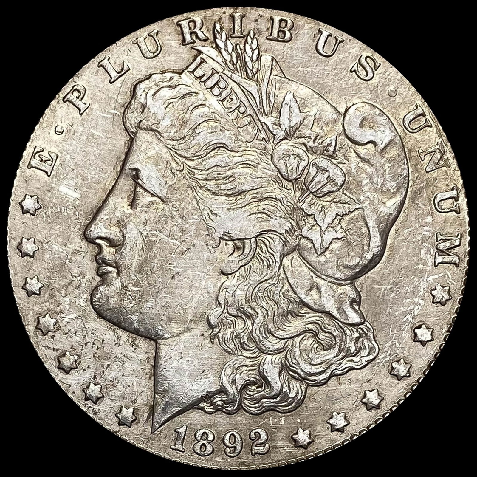 1892-O Silver Morgan Dollar NEARLY UNCIRCULATED (1 of 2)