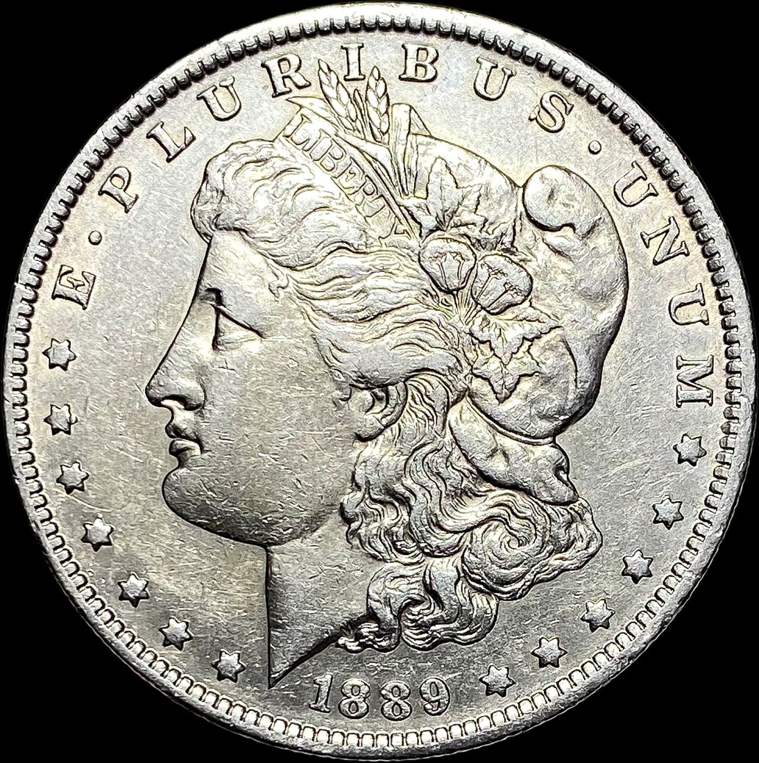 1889-O Silver Morgan Dollar CLOSELY UNCIRCULATED (1 of 2)