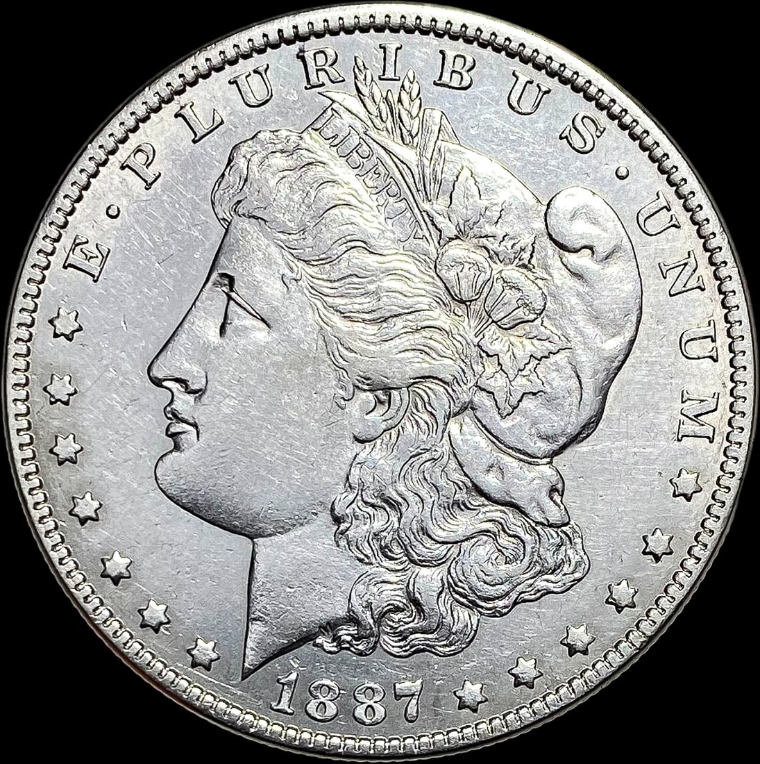 1887-O Morgan Silver Dollar CLOSELY UNCIRCULATED CLOSELY UNCIRCULATED (1 of 2)