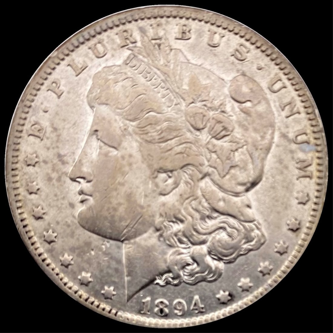 1894-O Morgan Silver Dollar NEARLY UNCIRCULATED (1 of 2)
