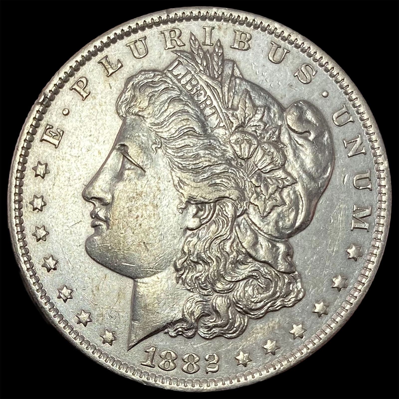 1882-O Silver Morgan Dollar CLOSELY UNCIRCULATED (1 of 2)