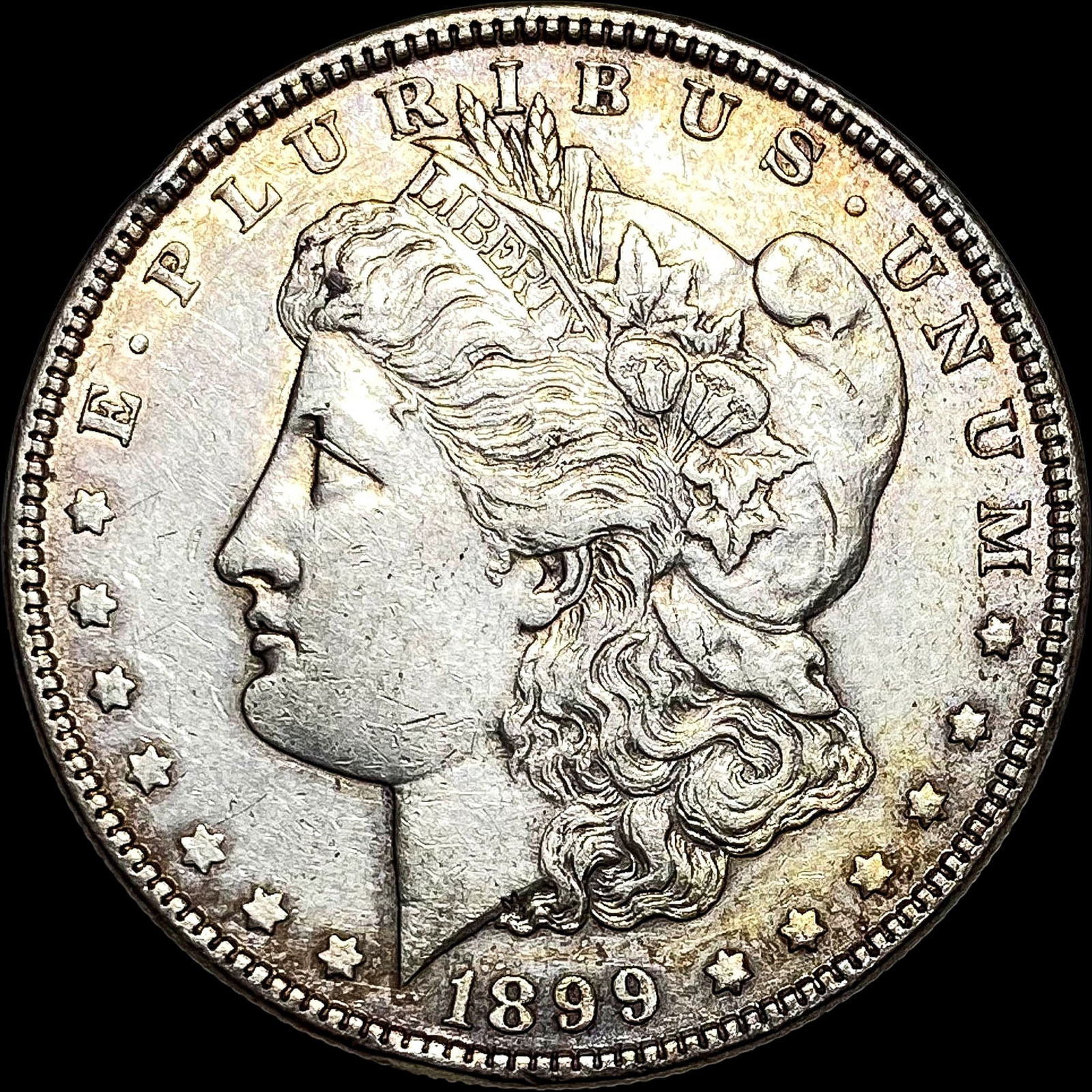 1899 Morgan Silver Dollar CLOSELY UNCIRCULATED (1 of 2)