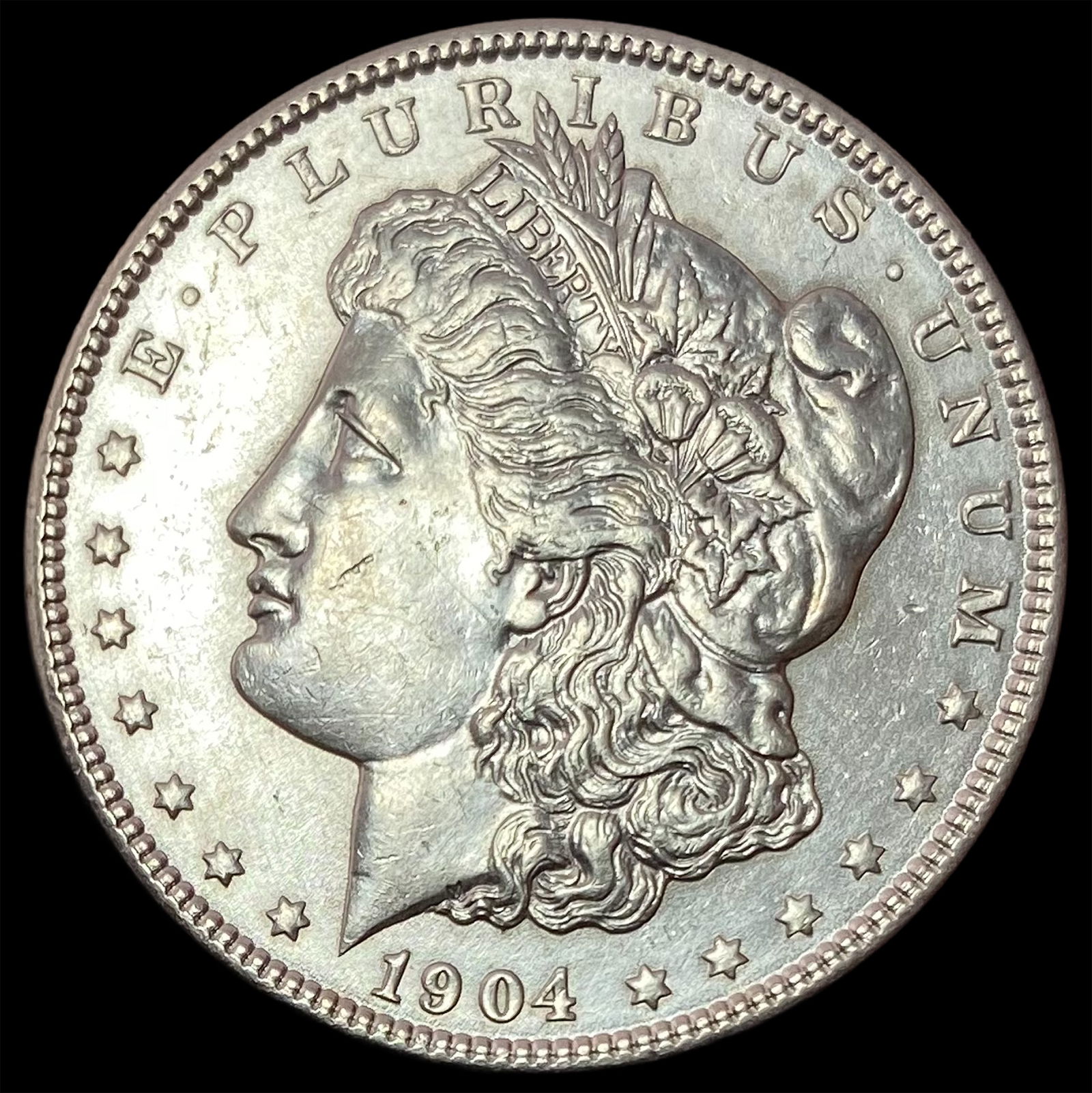 1904 Silver Morgan Dollar CLOSELY UNCIRCULATED (1 of 2)