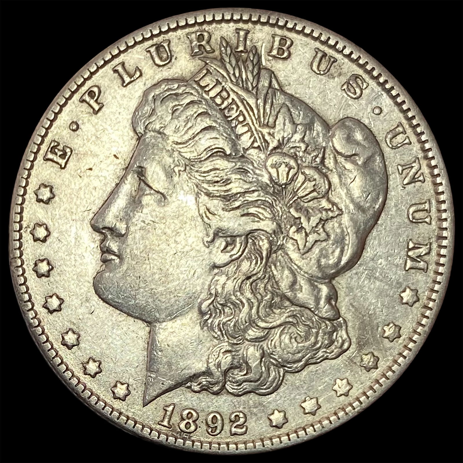 1892-O Silver Morgan Dollar NEARLY UNCIRCULATED (1 of 2)