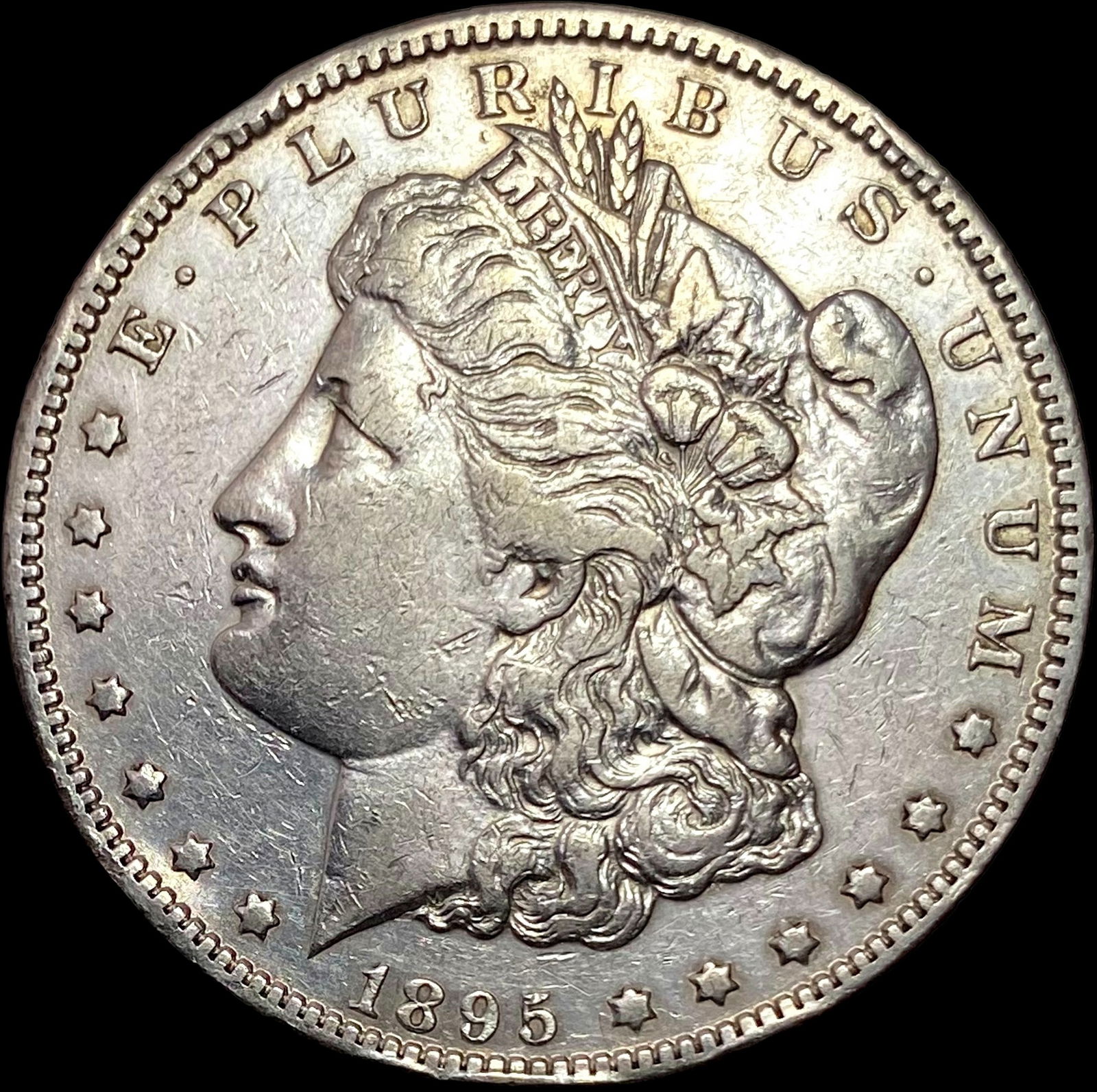 1895-O Morgan Silver Dollar NEARLY UNCIRCULATED (1 of 2)