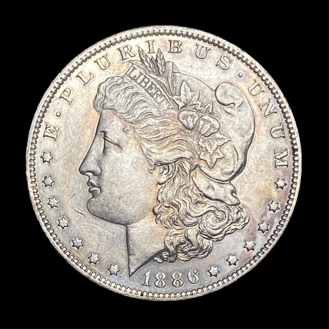 1886-O Morgan Silver Dollar CLOSELY  UNCIRCULATED (1 of 2)