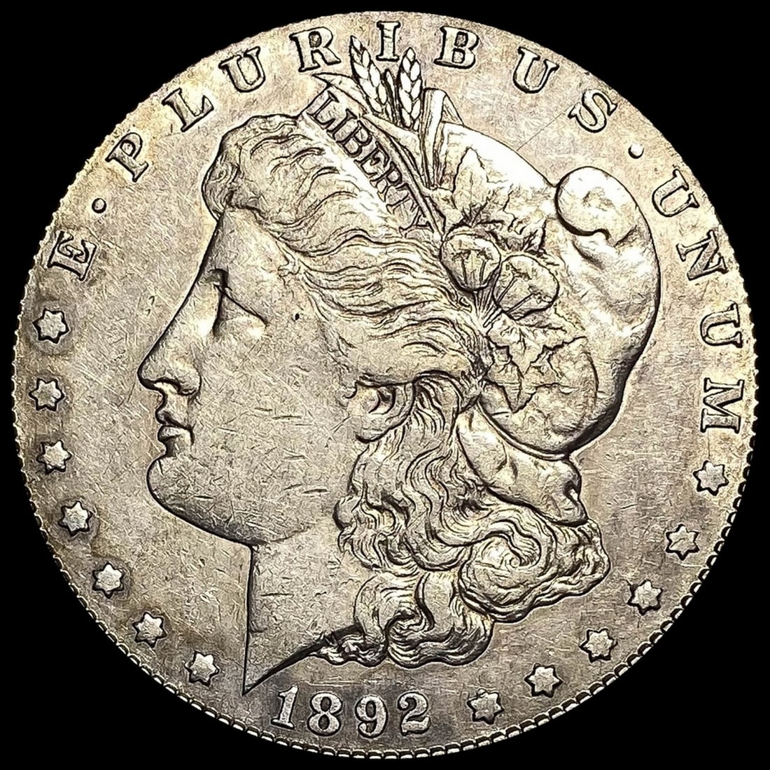 1892-S Silver Morgan Dollar NEARLY  UNCIRCULATED (1 of 2)