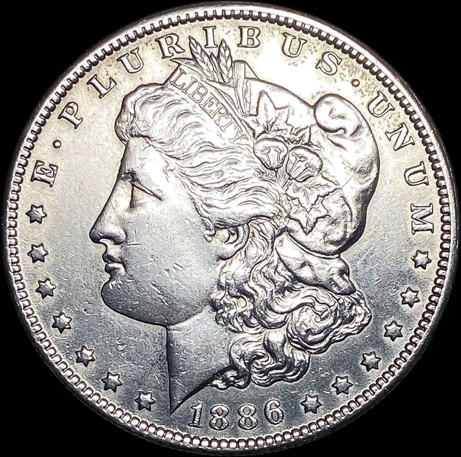 1886-O Silver Morgan Dollar CLOSELY UNCIRCULATED (1 of 2)