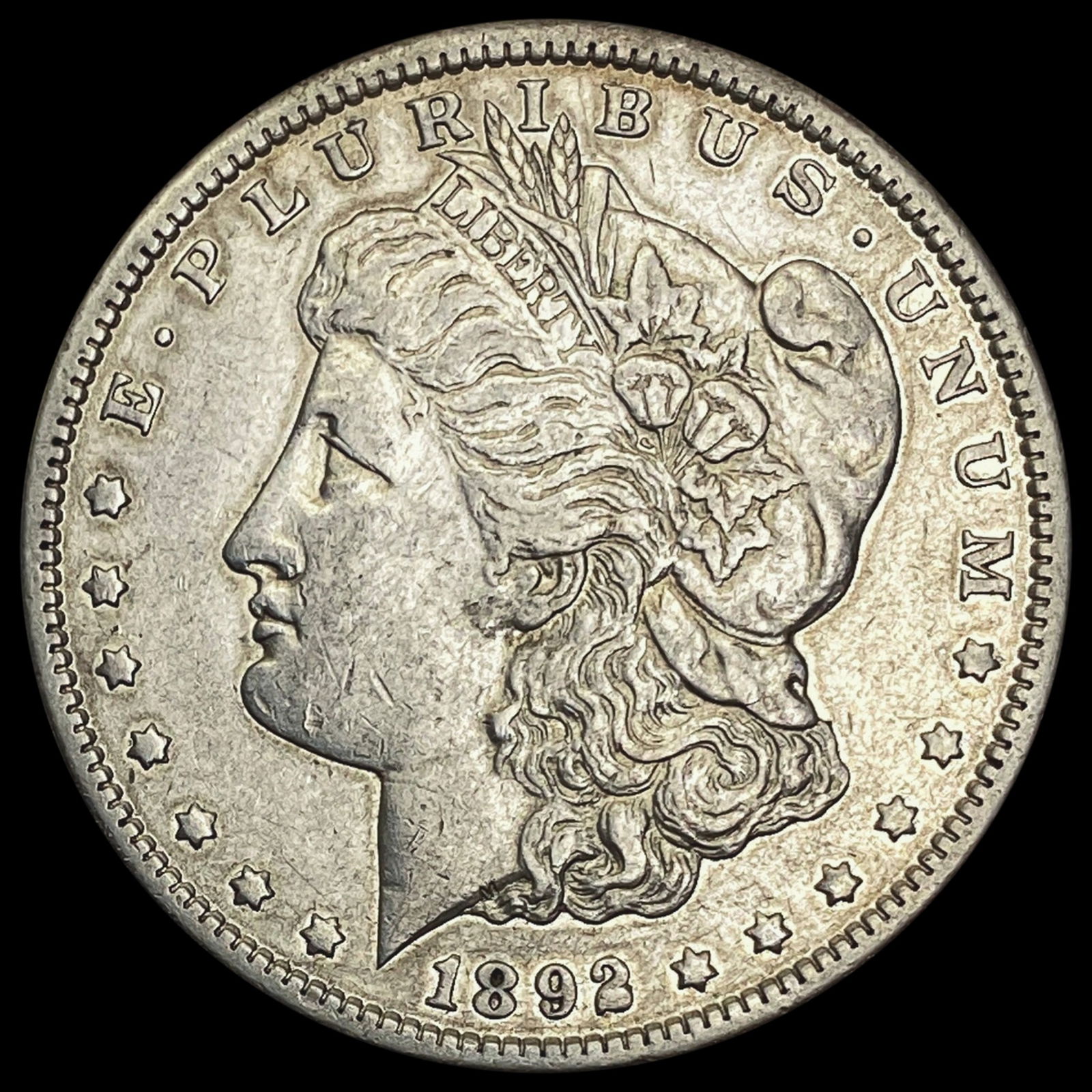 1892-CC Morgan Silver Dollar NEARLY UNCIRCULATED (1 of 2)