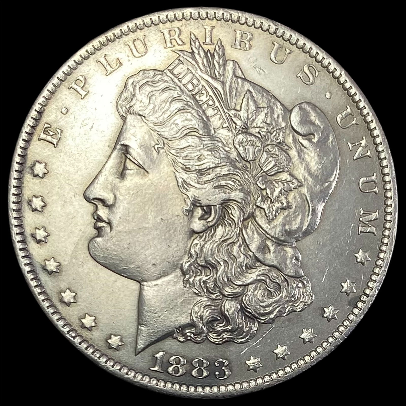1883-O Silver Morgan Dollar CLOSELY UNCIRCULATED (1 of 2)