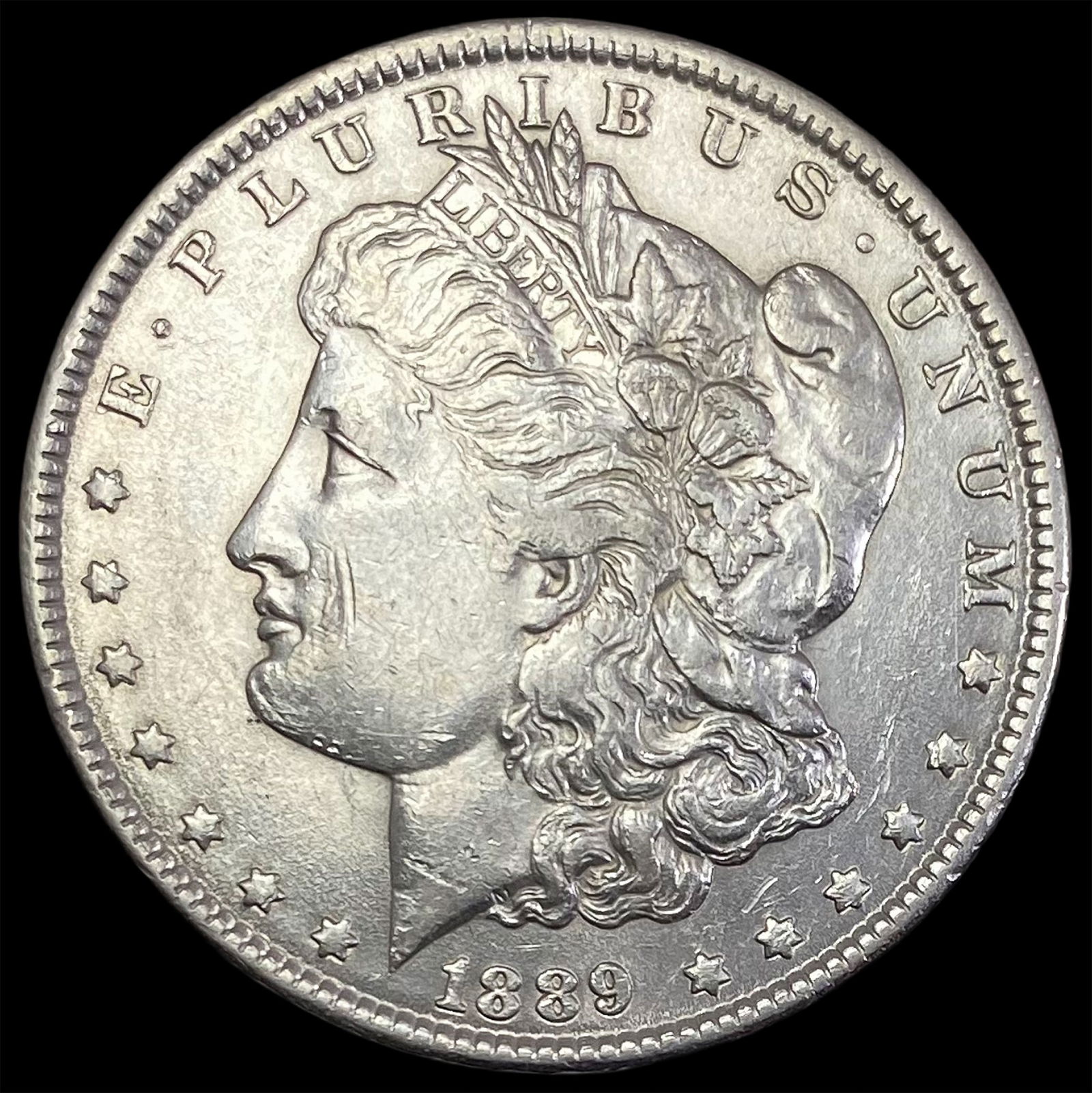 1889 Morgan Silver Dollar CLOSELY UNCIRCULATED (1 of 2)