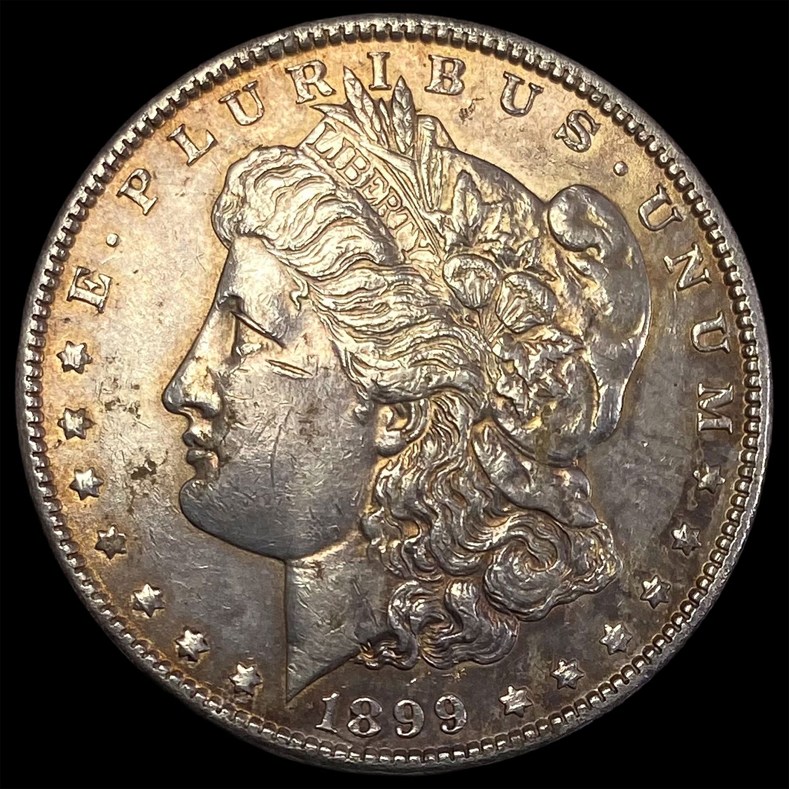 1899 Silver Morgan Dollar NEARLY UNCIRCULATED (1 of 2)