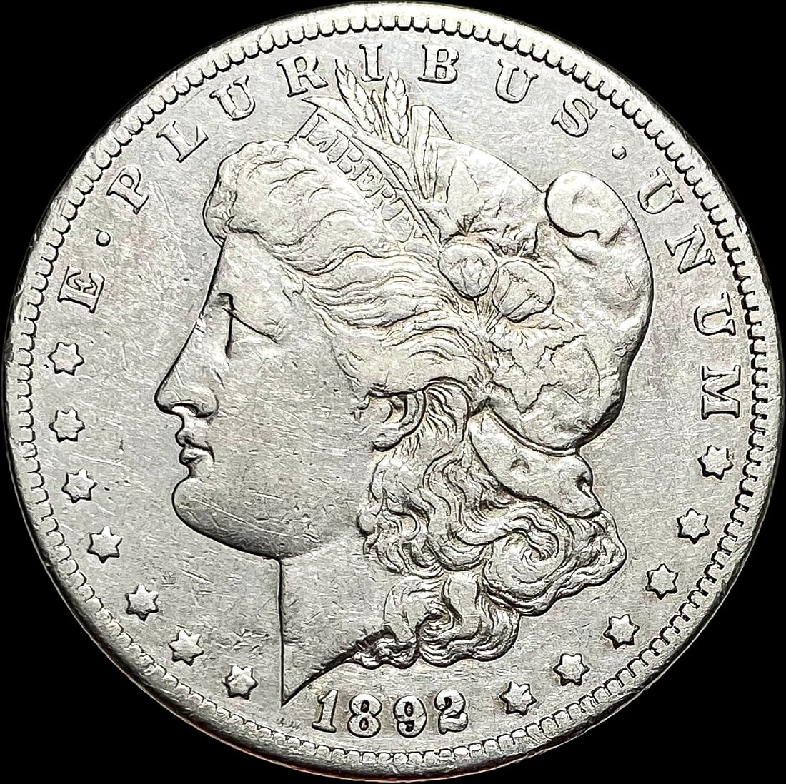 1892-CC Silver Morgan Dollar NEARLY UNCIRCULATED (1 of 2)