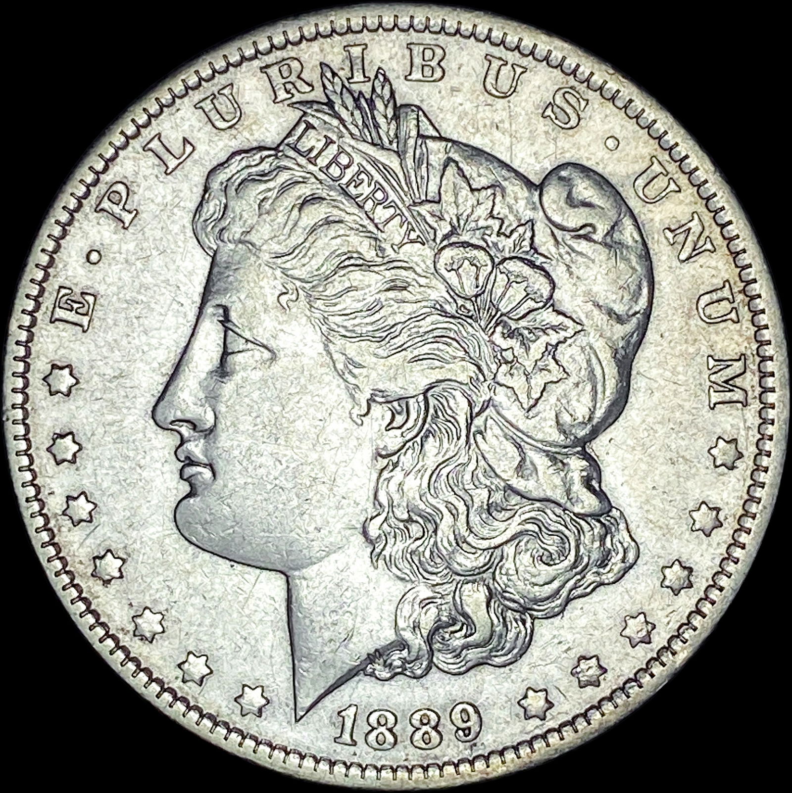1889-O Silver Morgan Dollar CLOSELY UNCIRCULATED (1 of 2)
