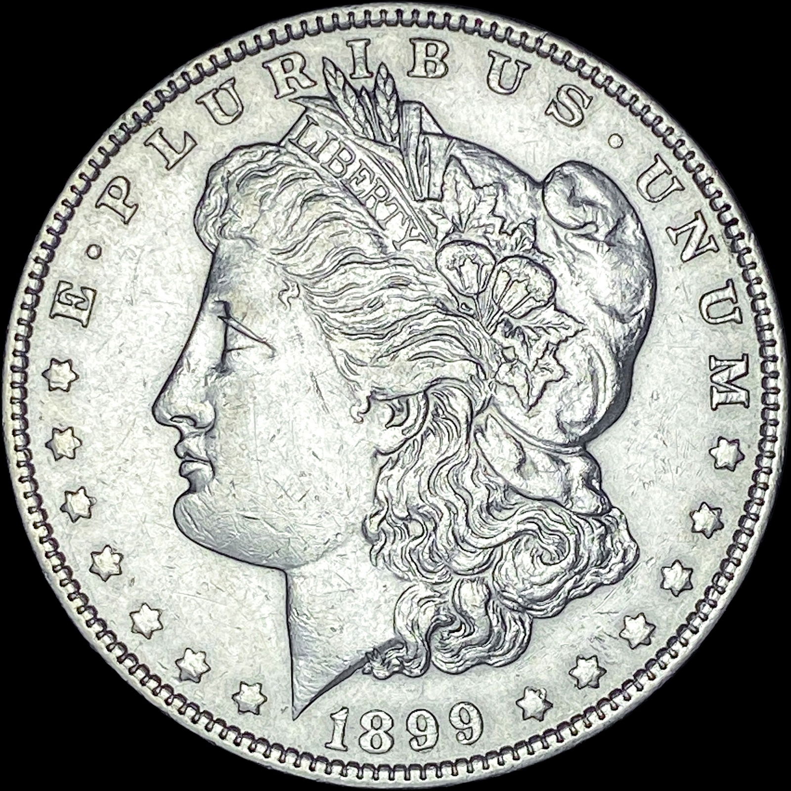 1899 Silver Morgan Dollar CLOSELY UNCIRCULATED (1 of 2)