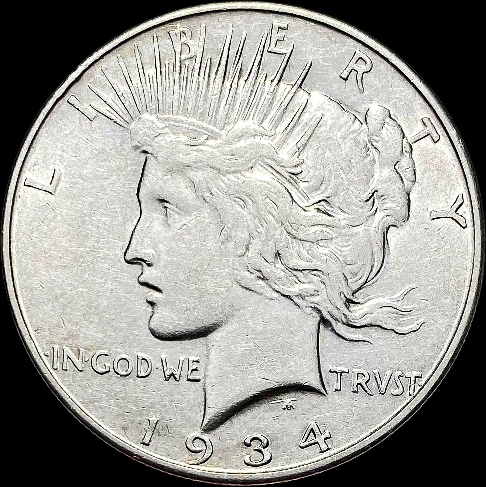 1934-D Silver Peace Dollar NEARLY UNCIRCULATED (1 of 2)