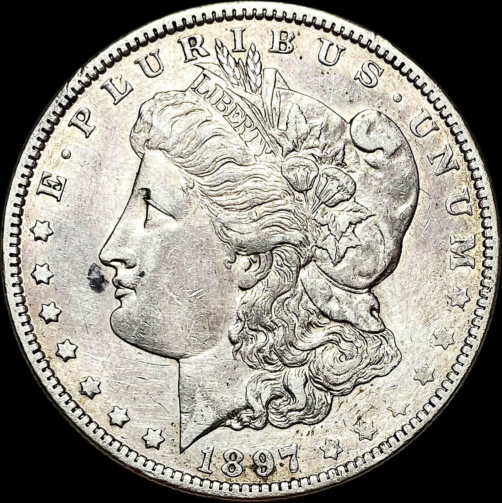1897-O Silver Morgan Dollar NEARLY UNCIRCULATED (1 of 2)