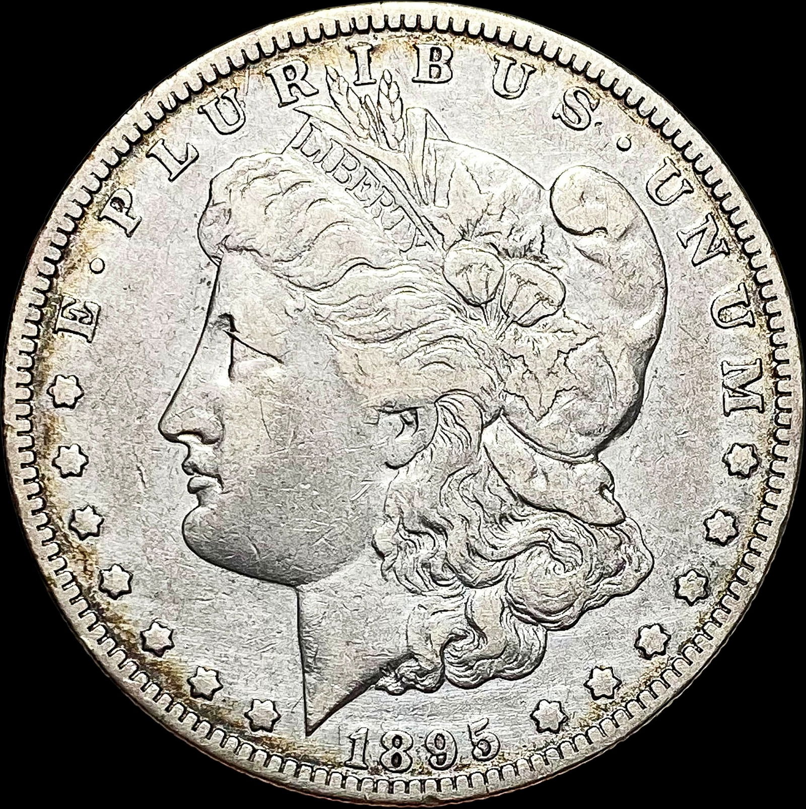 1895-O Silver Morgan Dollar NEARLY UNCIRCULATED (1 of 2)