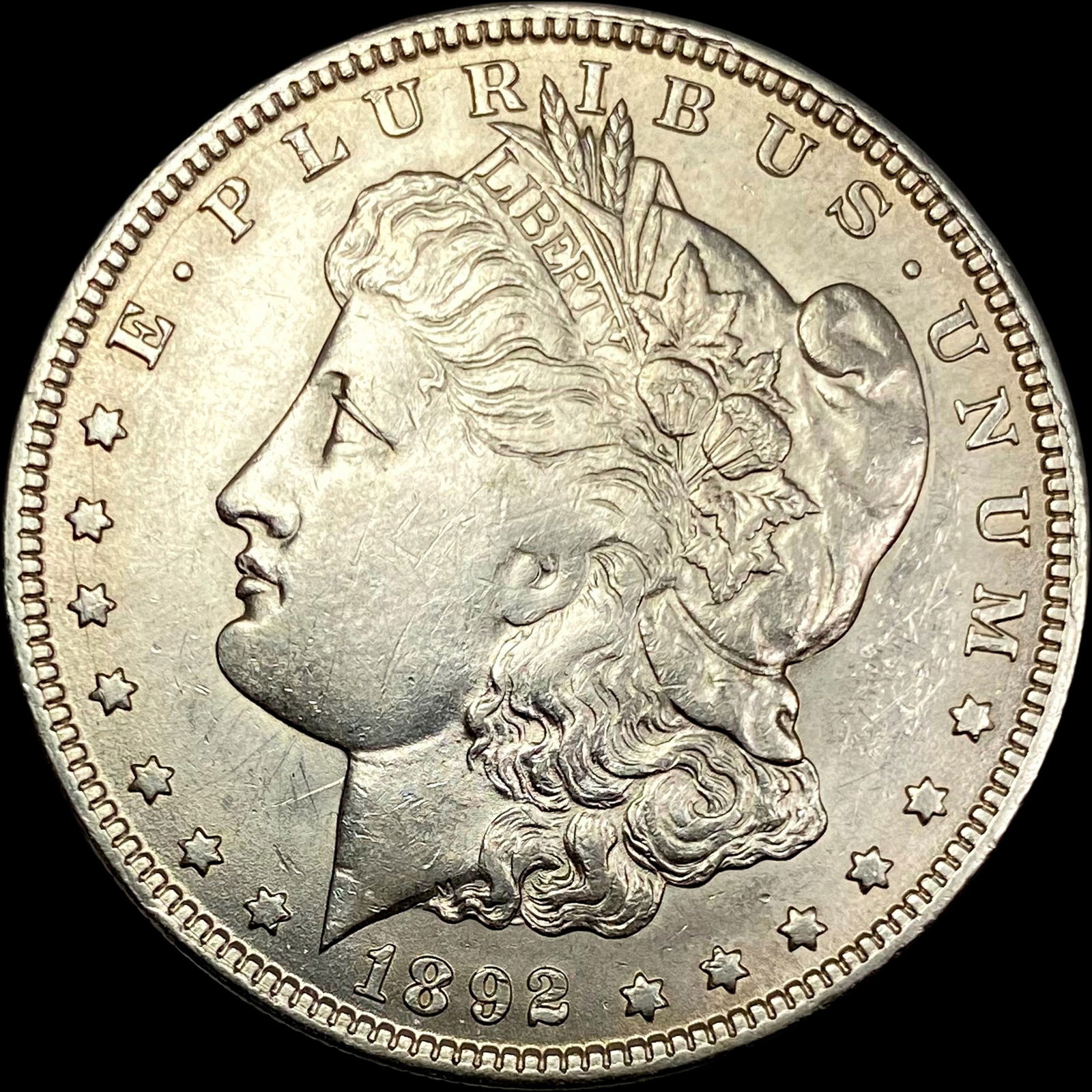 1892-O Silver Morgan Dollar NEARLY UNCIRCULATED (1 of 2)