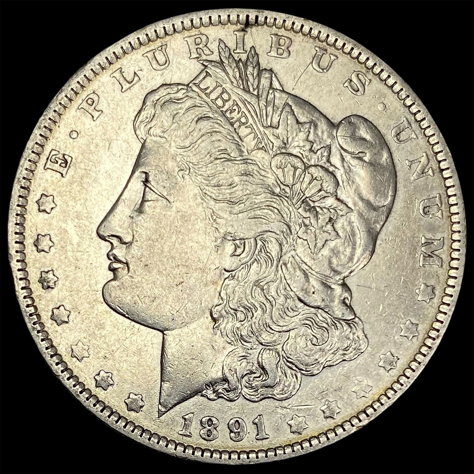 1891-O Silver Morgan Dollar NEARLY UNCIRCULATED (1 of 2)