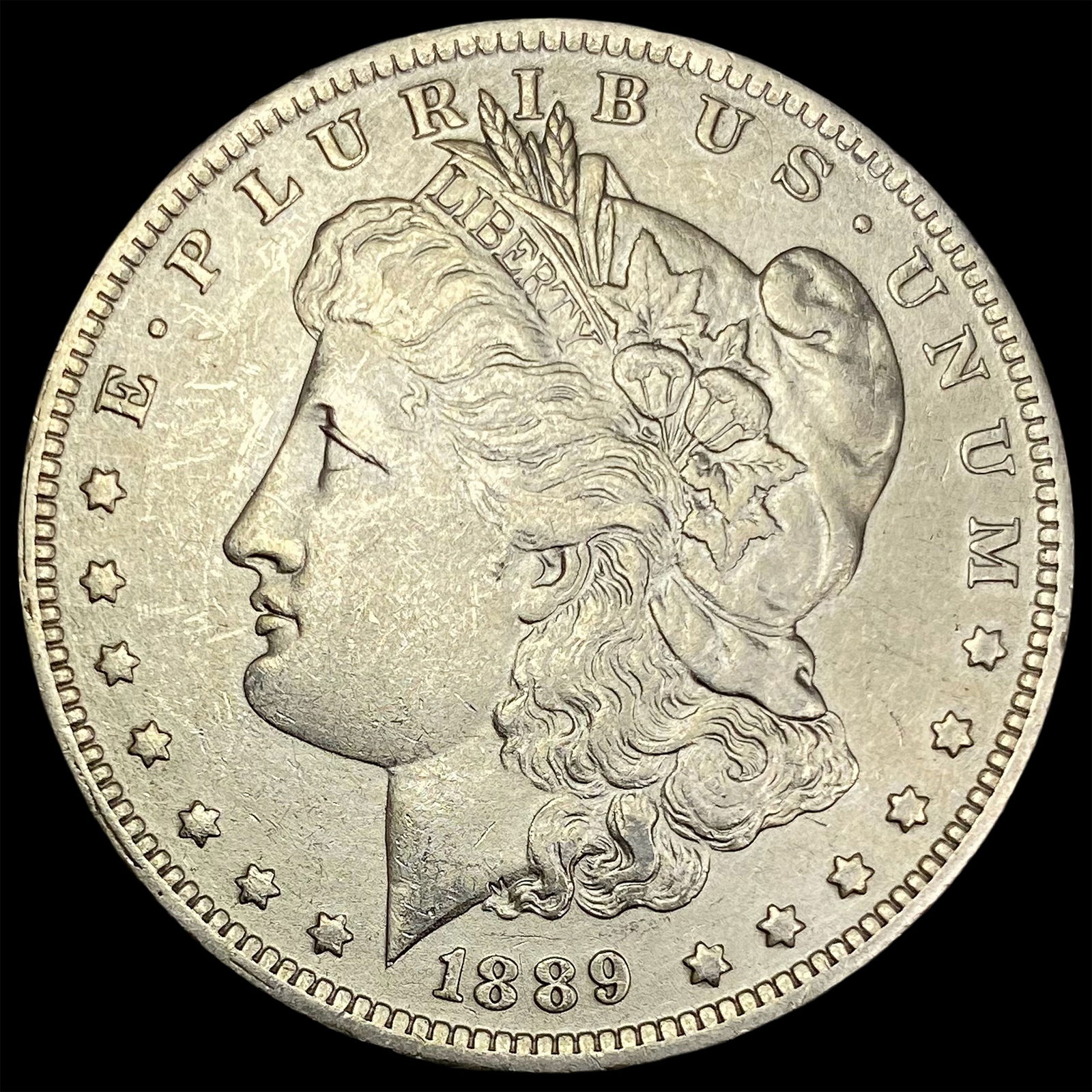 1889-O Silver Morgan Dollar CLOSELY UNCIRCULATED (1 of 2)