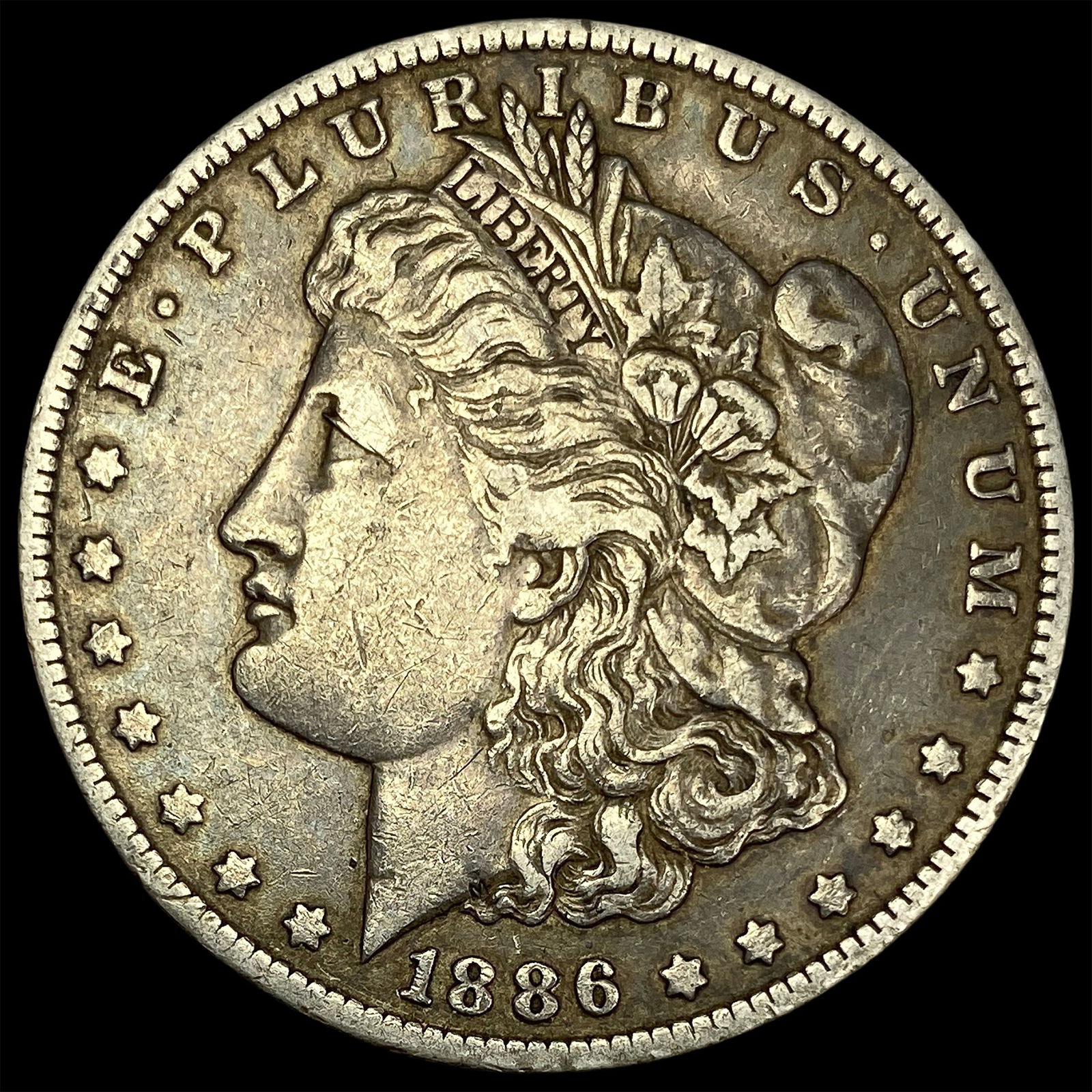 1886-O Silver Morgan Dollar NEARLY UNCIRCULATED (1 of 2)