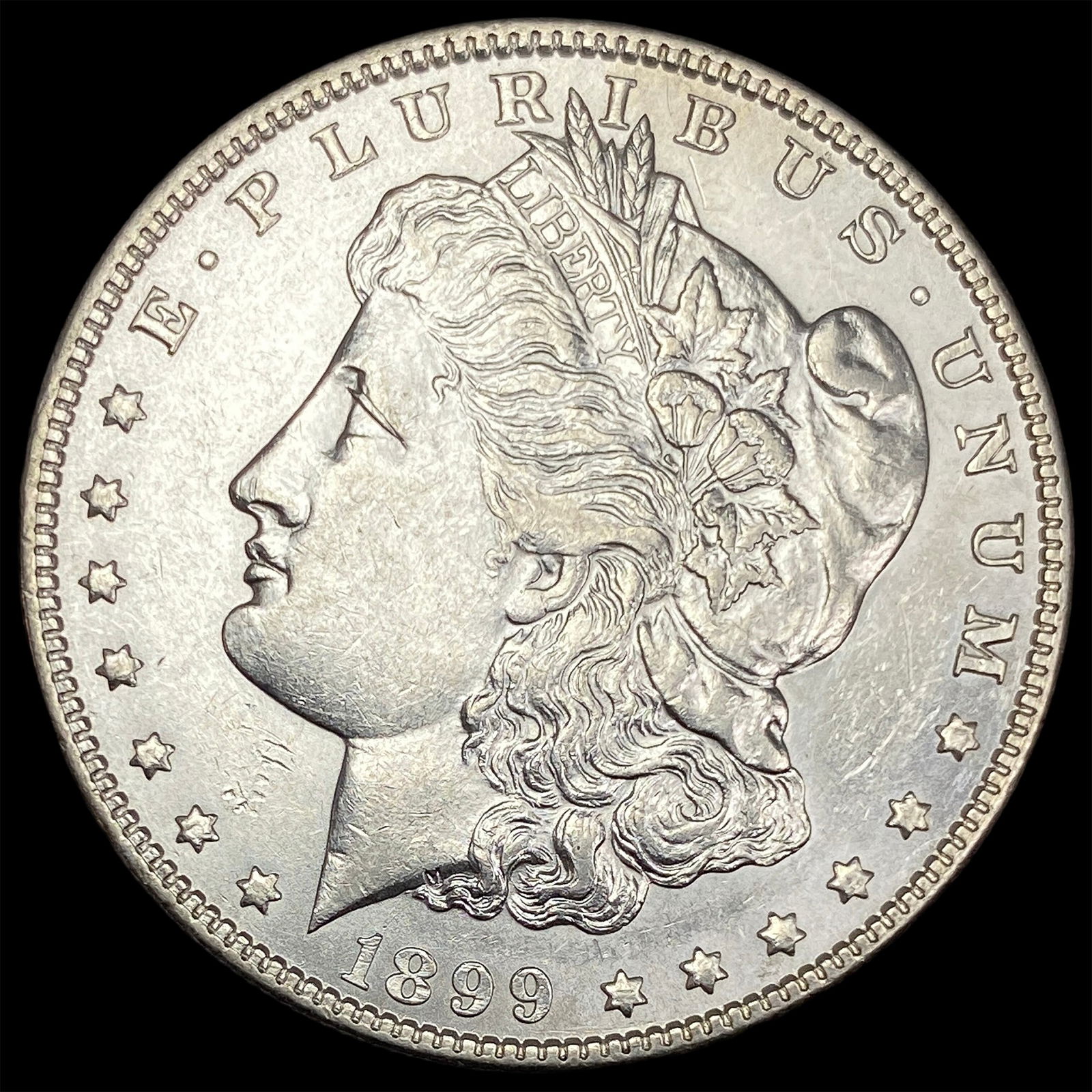 1899 Silver Morgan Dollar CLOSELY UNCIRCULATED (1 of 2)