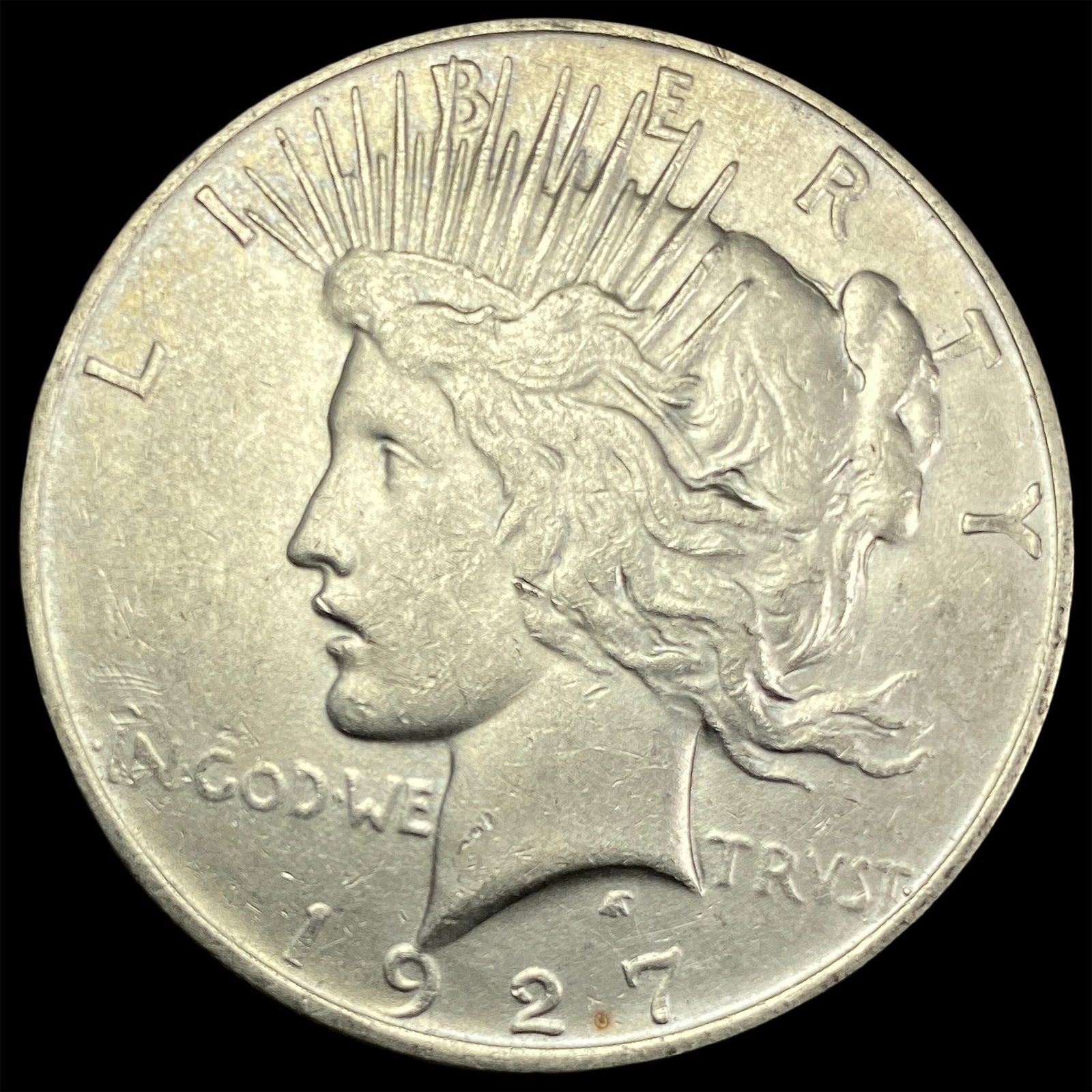 1927-D Peace Silver Dollar UNC (1 of 2)