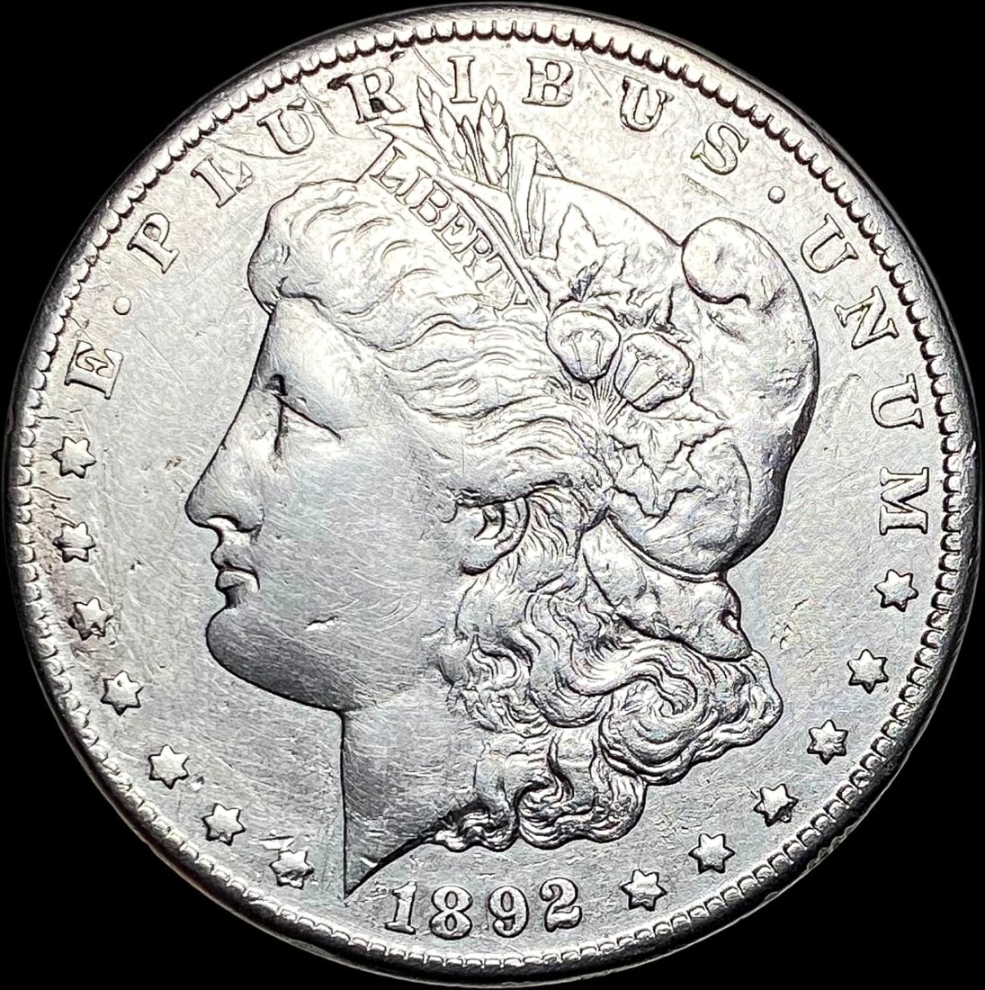 1892-CC Morgan Silver Dollar NEARLY UNCIRCULATED (1 of 2)