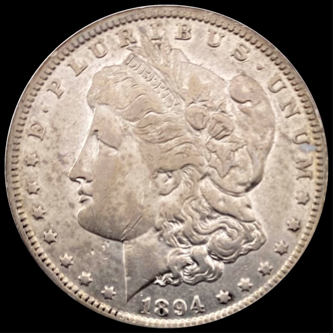 1894-O Morgan Silver Dollar NEARLY UNCIRCULATED (1 of 2)