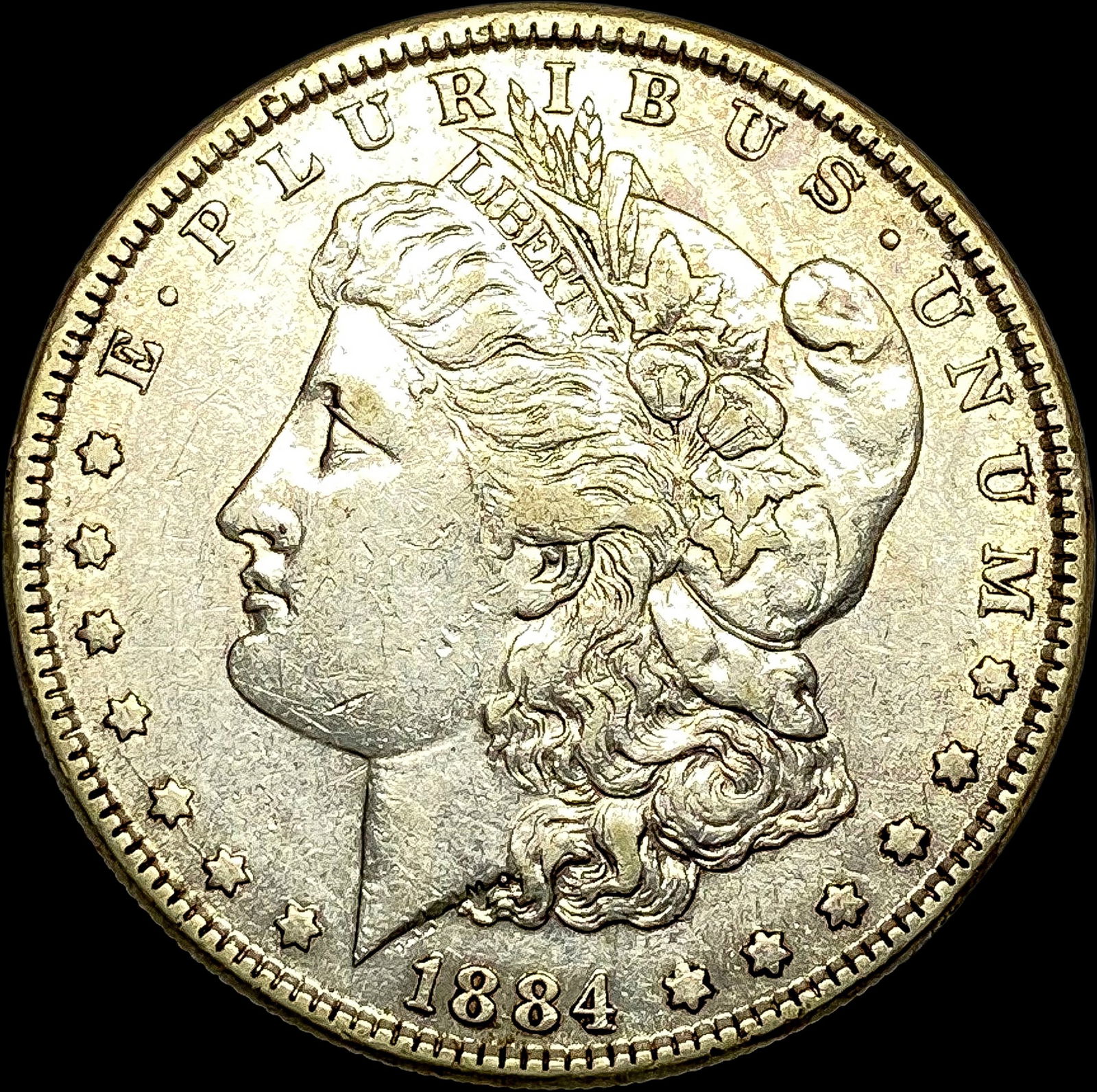 1884 Silver Morgan Dollar CLOSELY UNCIRCULATED (1 of 2)