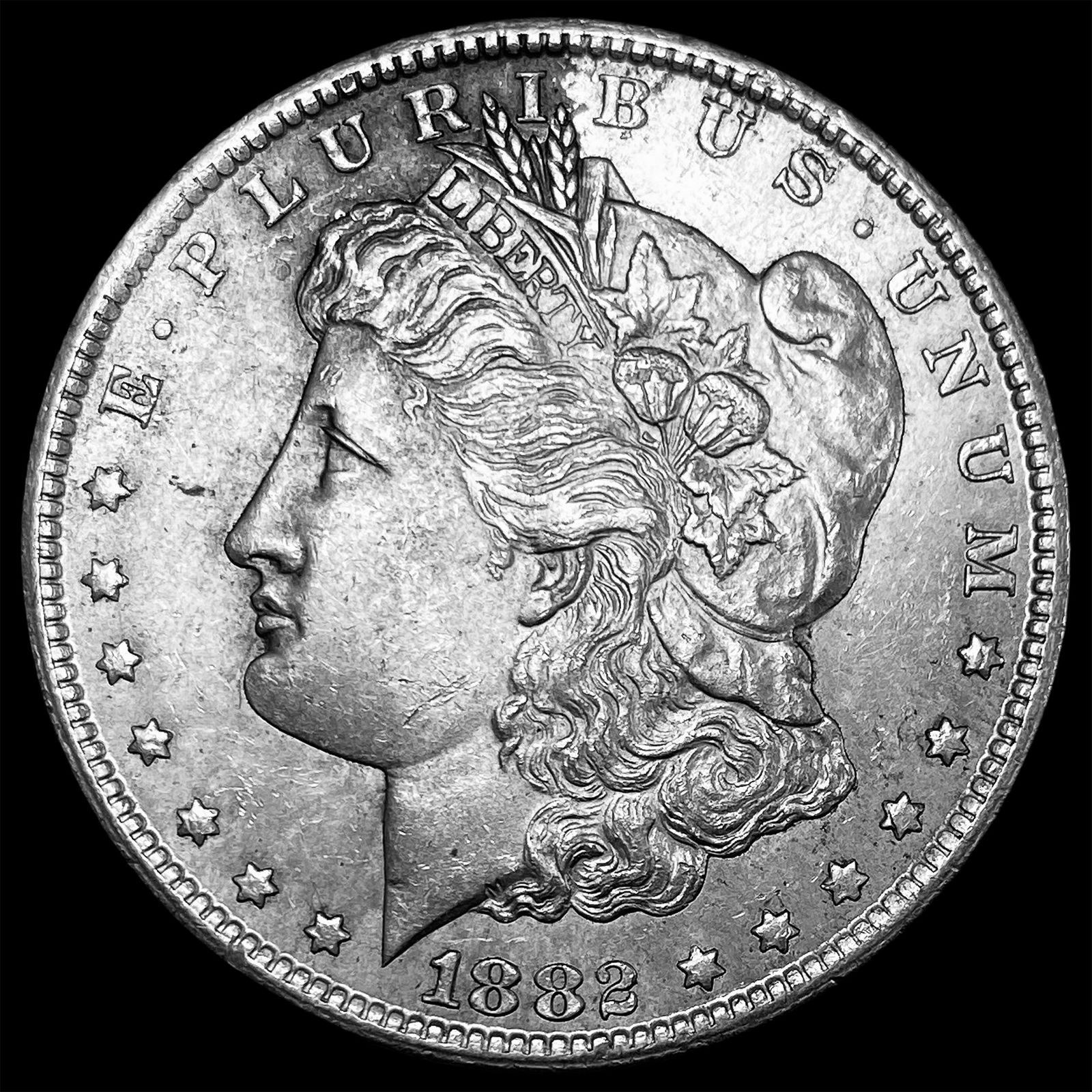 1882-CC Silver Morgan Dollar CLOSELY UNCIRCULATED (1 of 2)