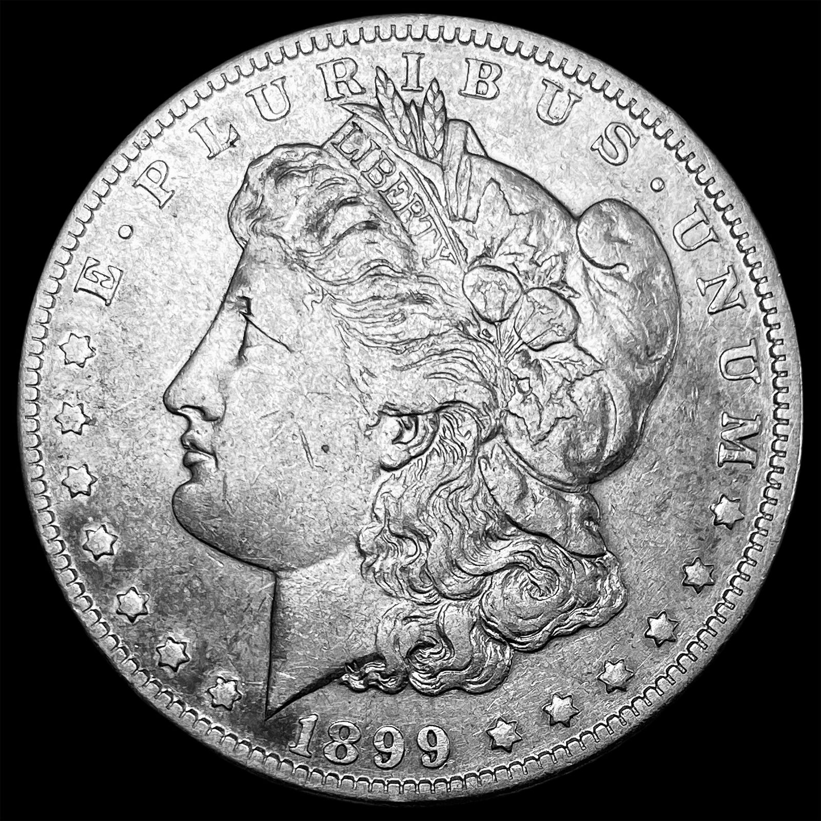 1899 Micro O Silver Morgan Dollar NEARLY UNCIRCULATED (1 of 2)