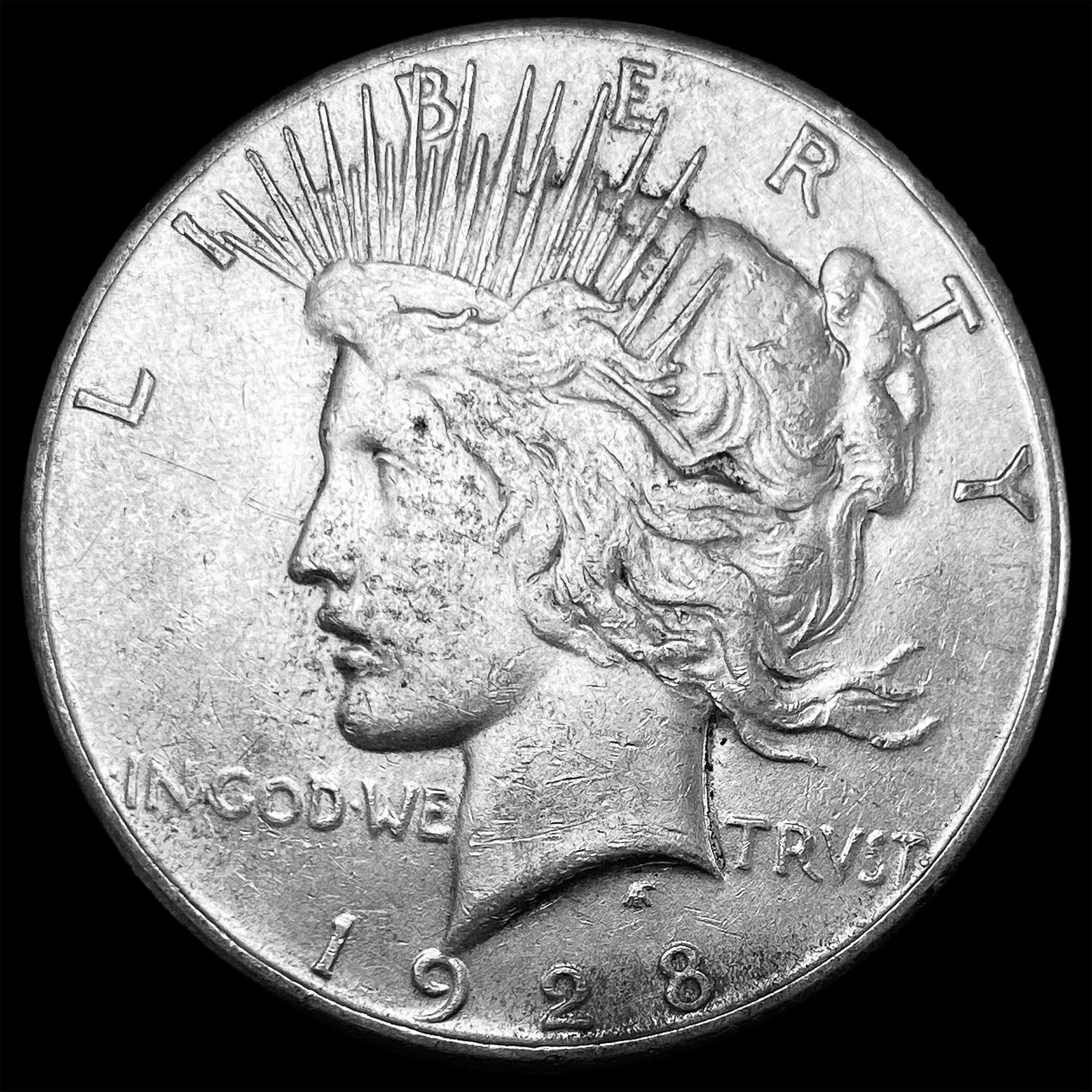 1928-S Silver Peace Dollar NEARLY UNCIRCULATED (1 of 2)