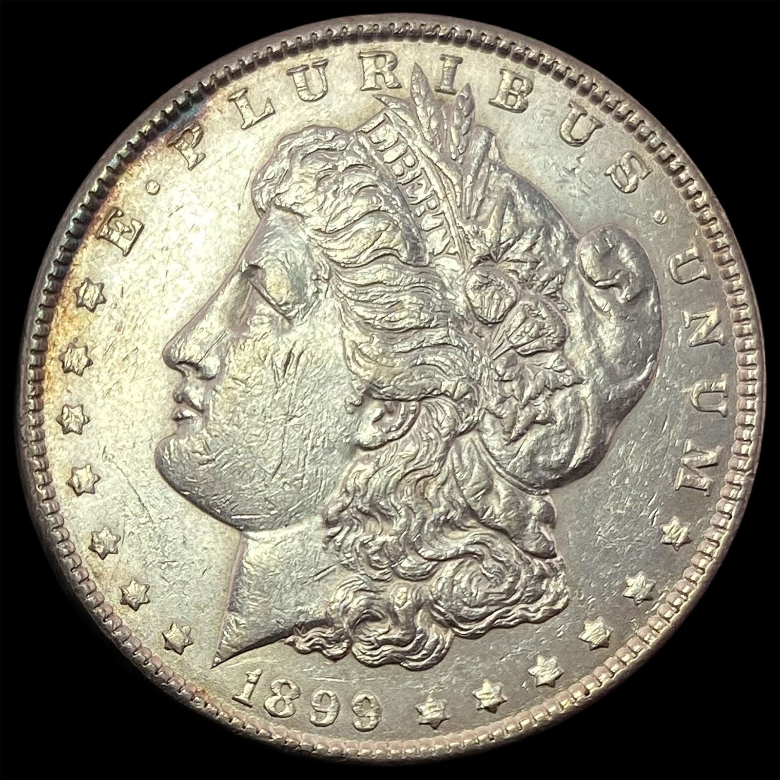 1899 Silver Morgan Dollar CLOSELY  UNCIRCULATED (1 of 2)