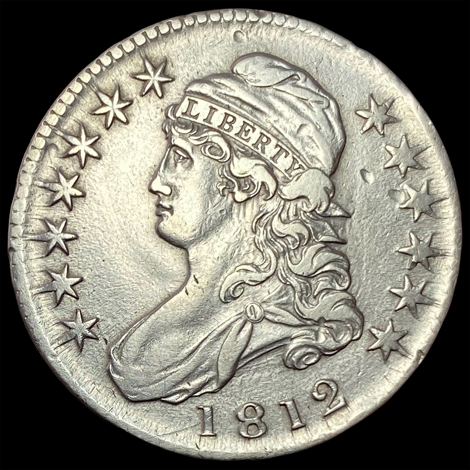 1812 Capped Bust Half Dollar NEARLY UNCIRCULATED (1 of 2)