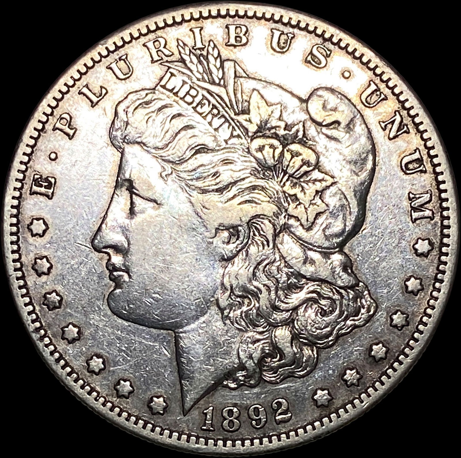 1892-S Silver Morgan Dollar NEARLY  UNCIRCULATED (1 of 2)