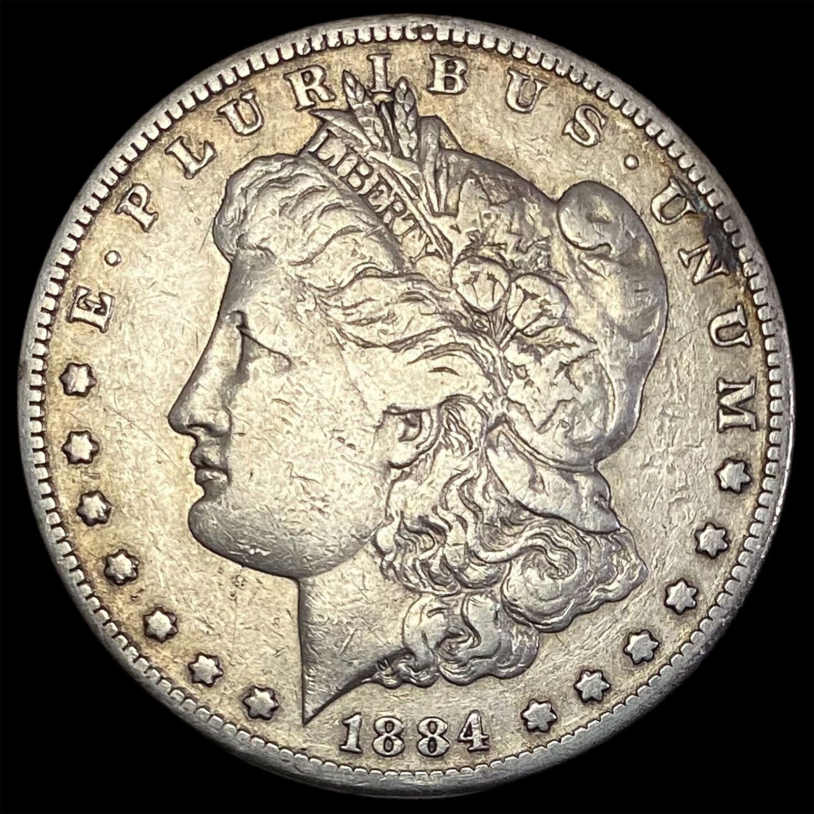 1884-S Silver Morgan Dollar NEARLY  UNCIRCULATED (1 of 2)