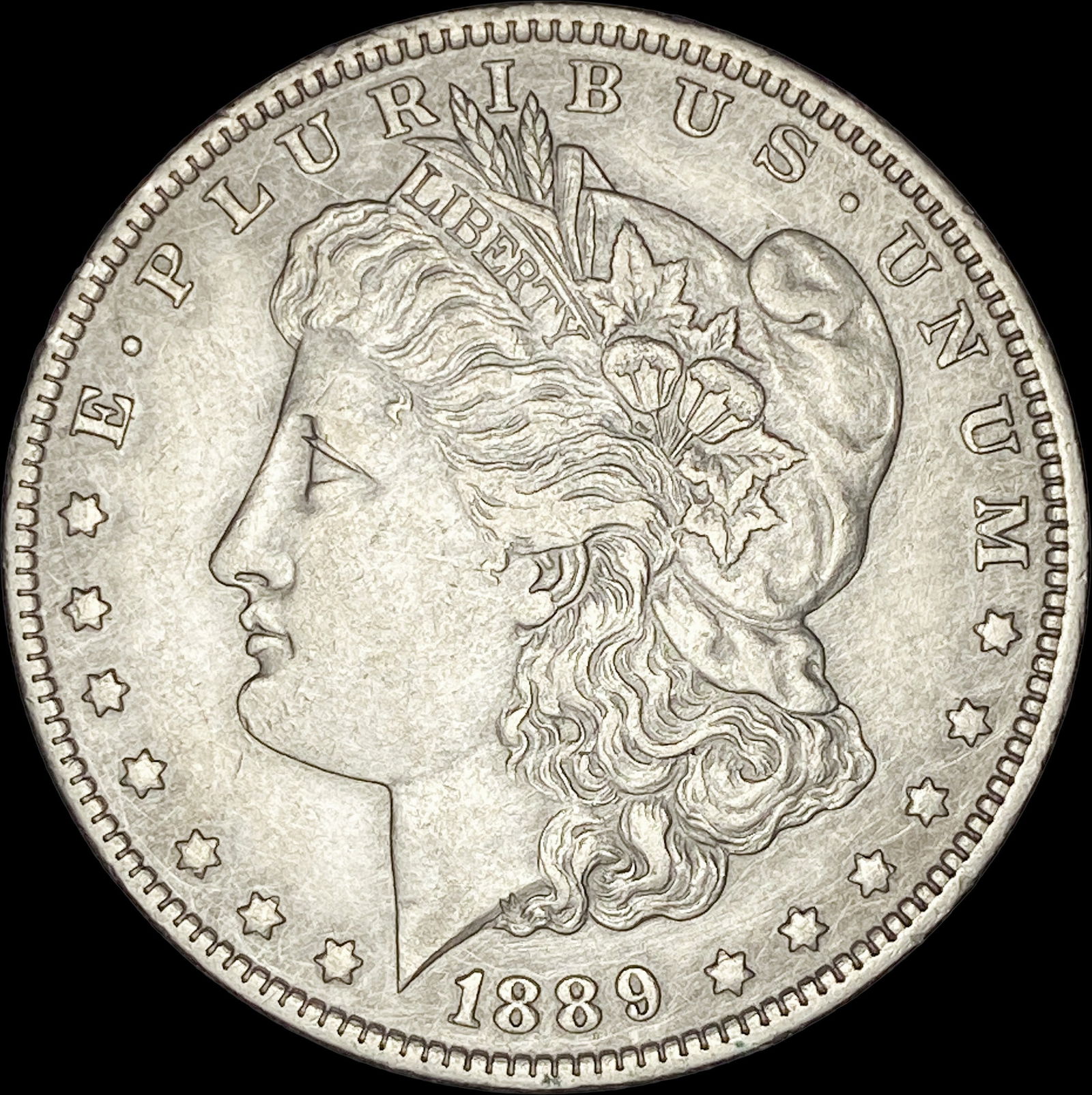 1889-O Silver Morgan Dollar CLOSELY  UNCIRCULATED (1 of 2)