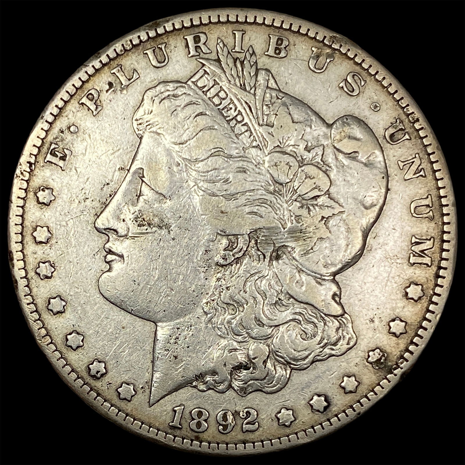 1892-S Silver Morgan Dollar NEARLY UNCIRCULATED (1 of 2)