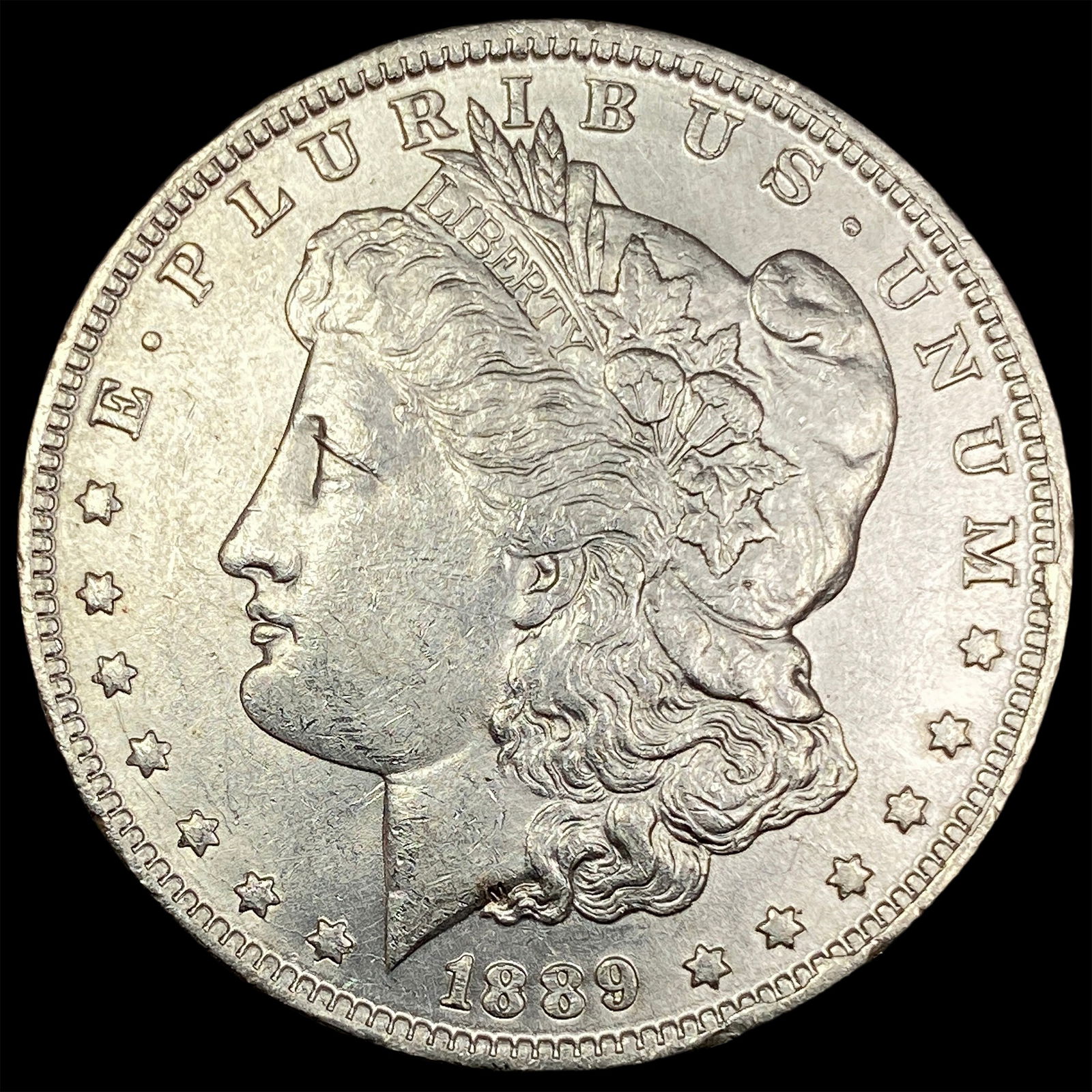1889-O Silver Morgan Dollar CLOSELY UNCIRCULATED (1 of 2)