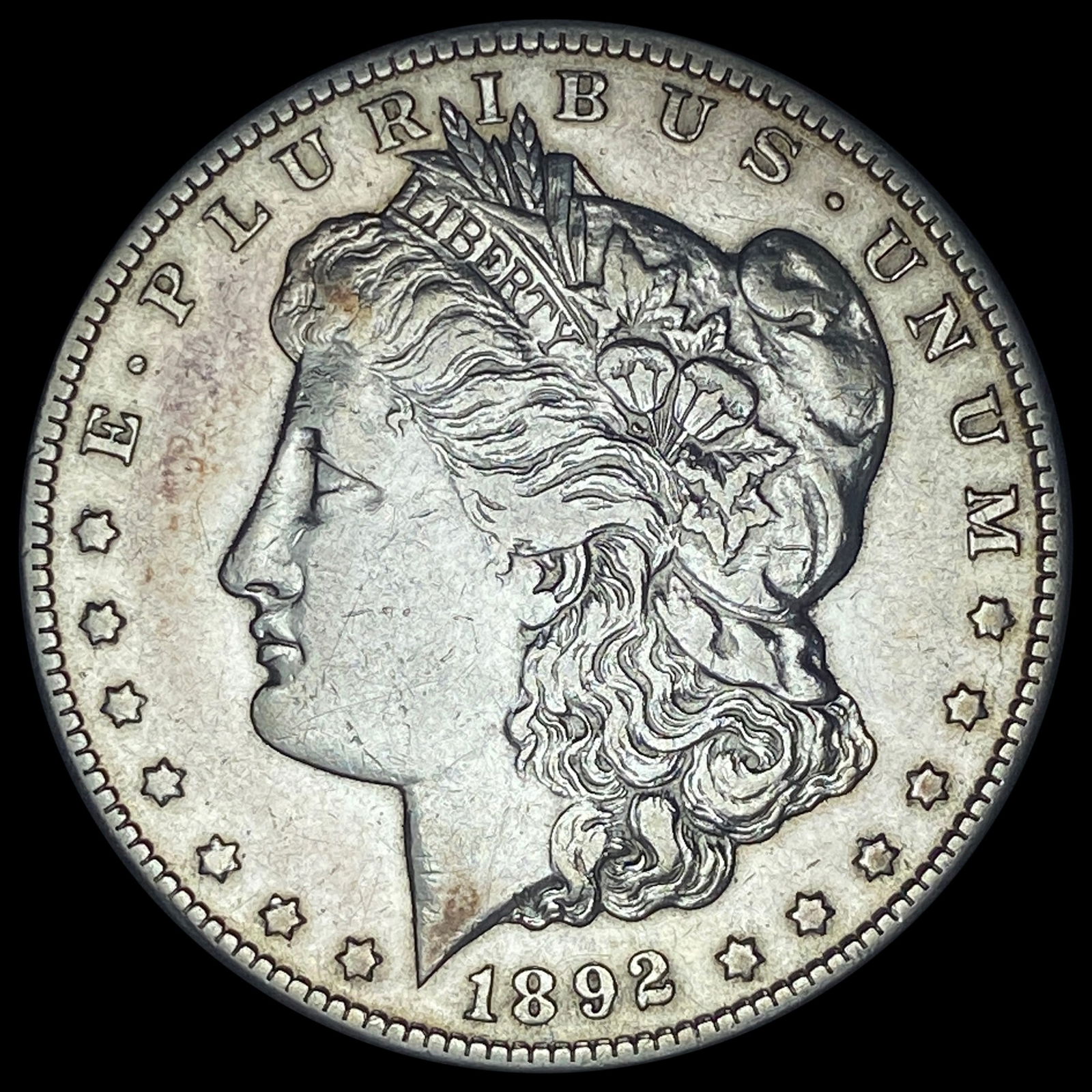 1892-CC Silver Morgan Dollar NEARLY UNCIRCULATED (1 of 2)