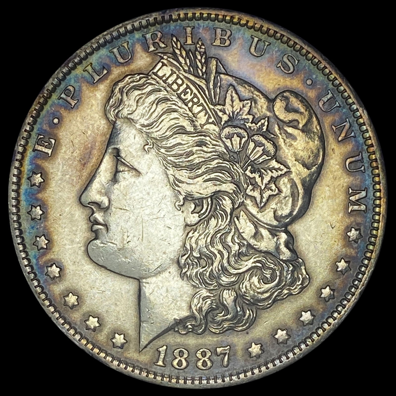 1887-O Silver Morgan Dollar CLOSELY UNCIRCULATED (1 of 2)