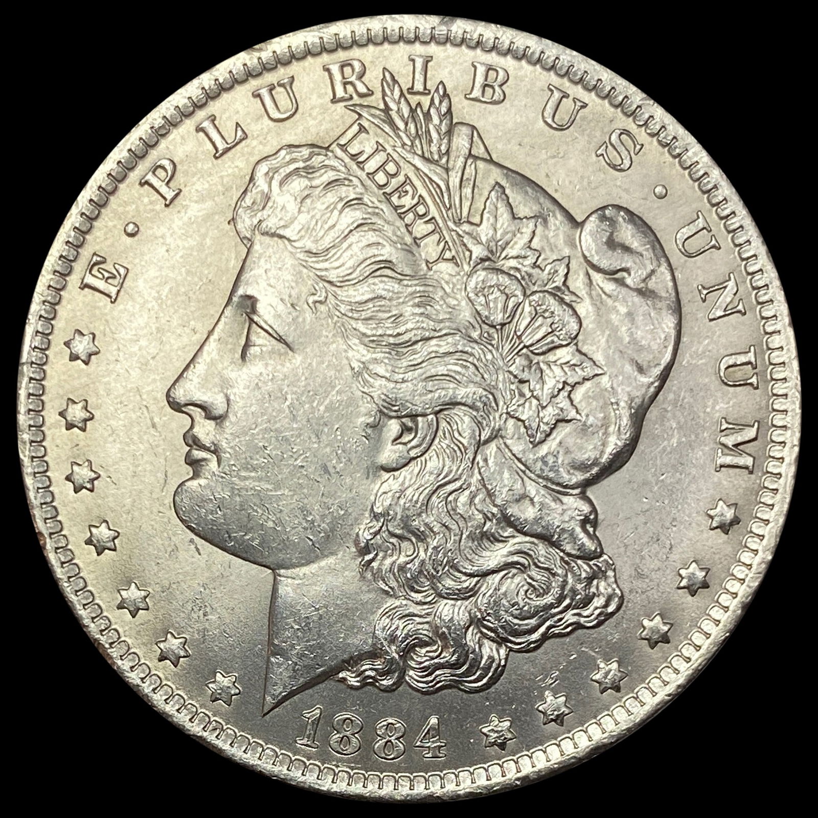 1884-O Morgan Silver Dollar UNC (1 of 2)