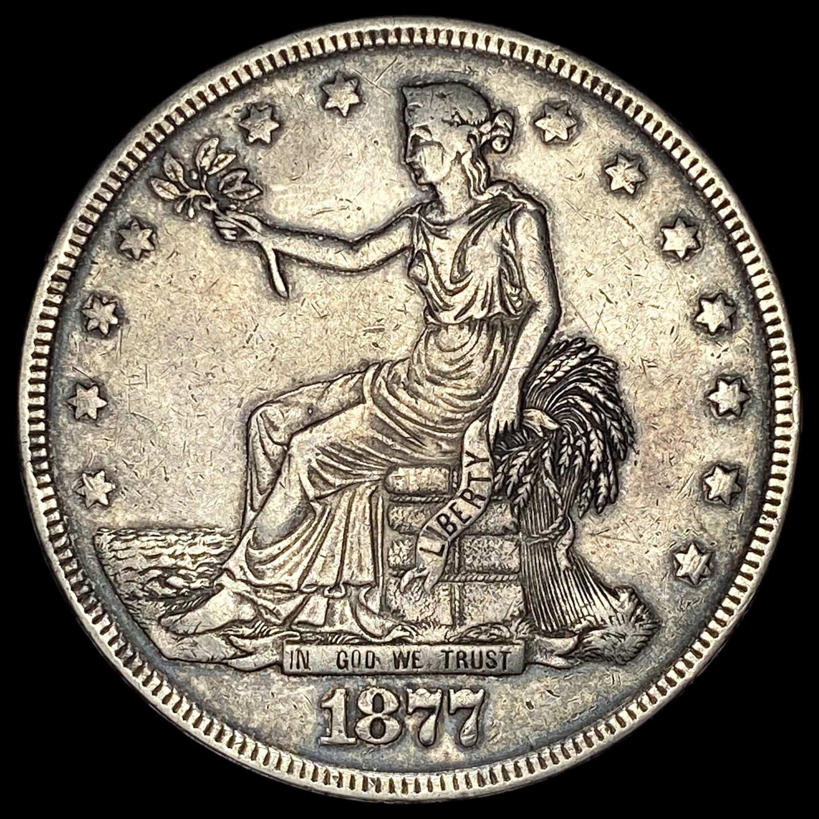 1877 Silver Trade Dollar NEARLY UNCIRCULATED (1 of 2)