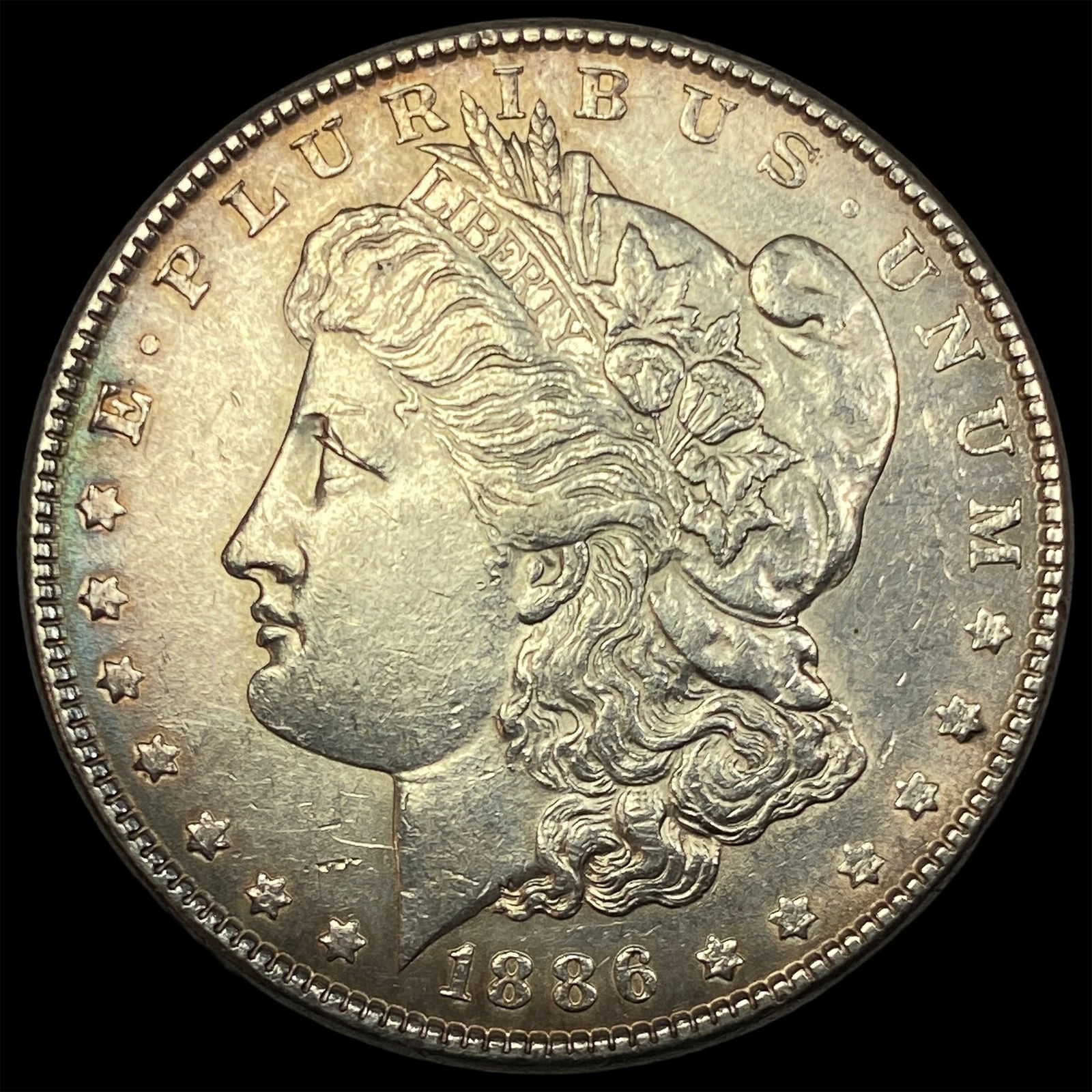1886 Silver Morgan Dollar CLOSELY UNCIRCULATED (1 of 2)
