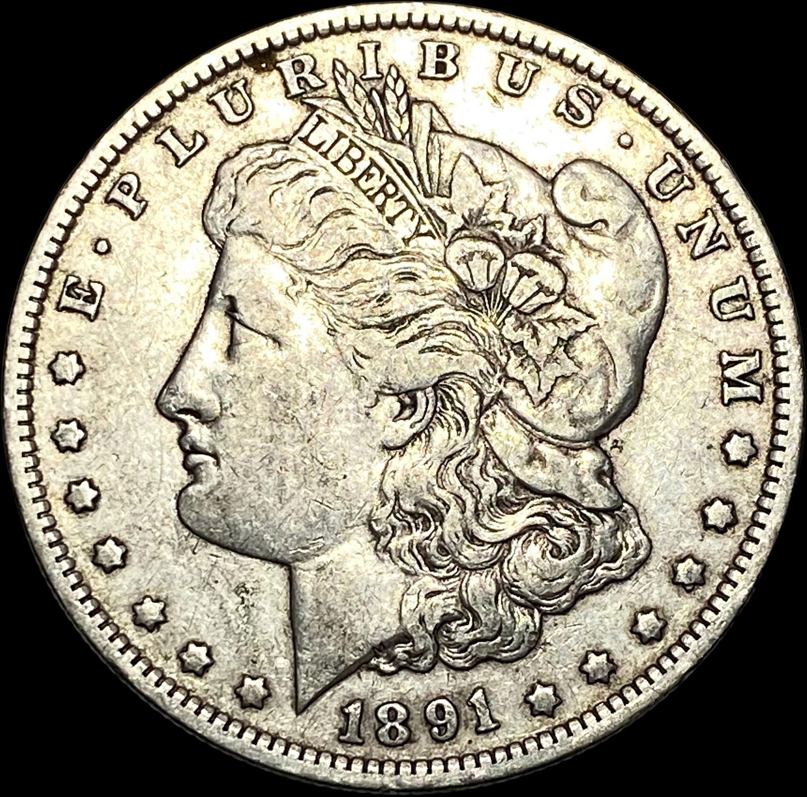 1891-O Silver Morgan Dollar NEARLY UNCIRCULATED (1 of 2)