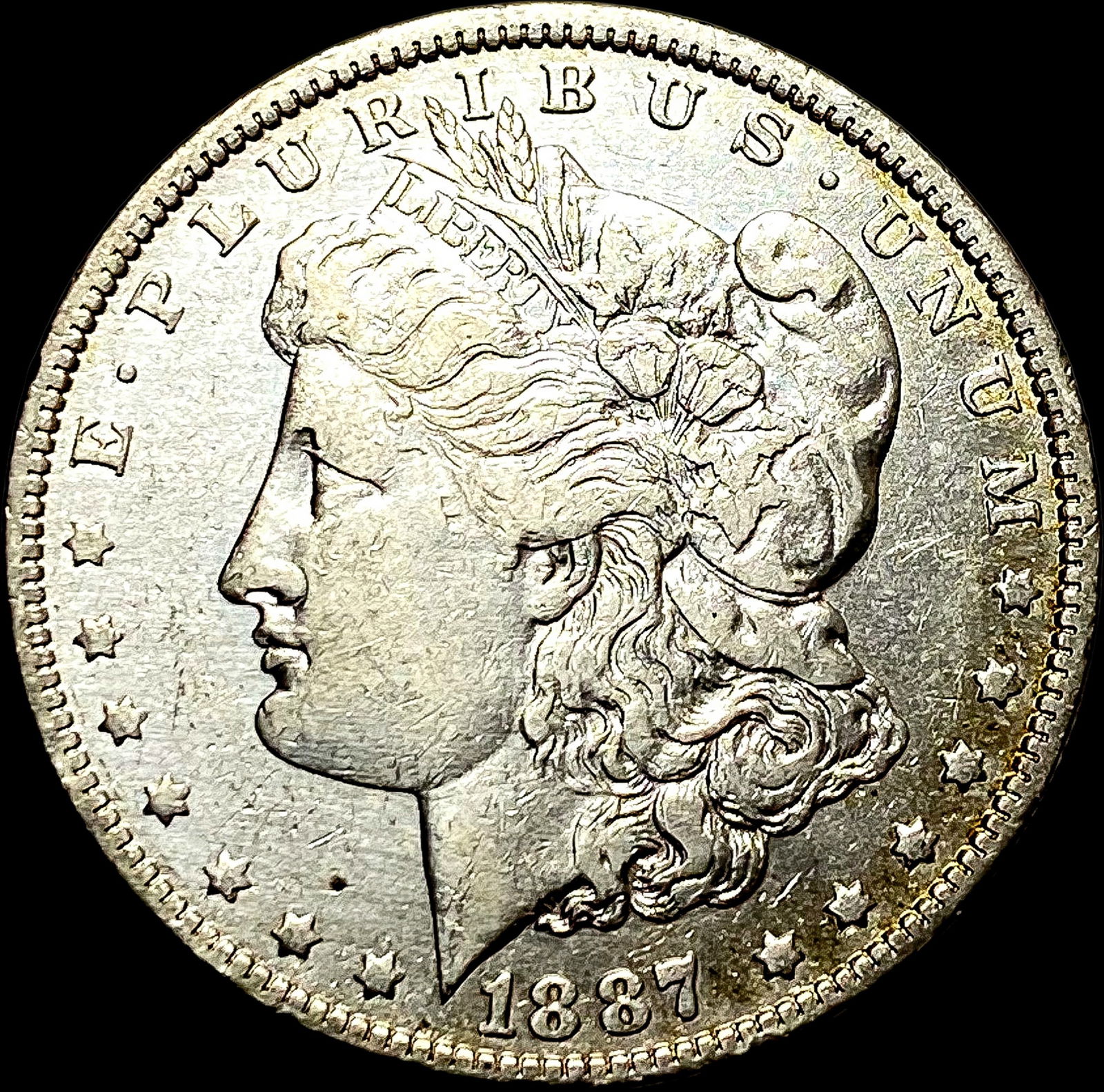 1887-O Silver Morgan Dollar CLOSELY UNCIRCULATED (1 of 2)
