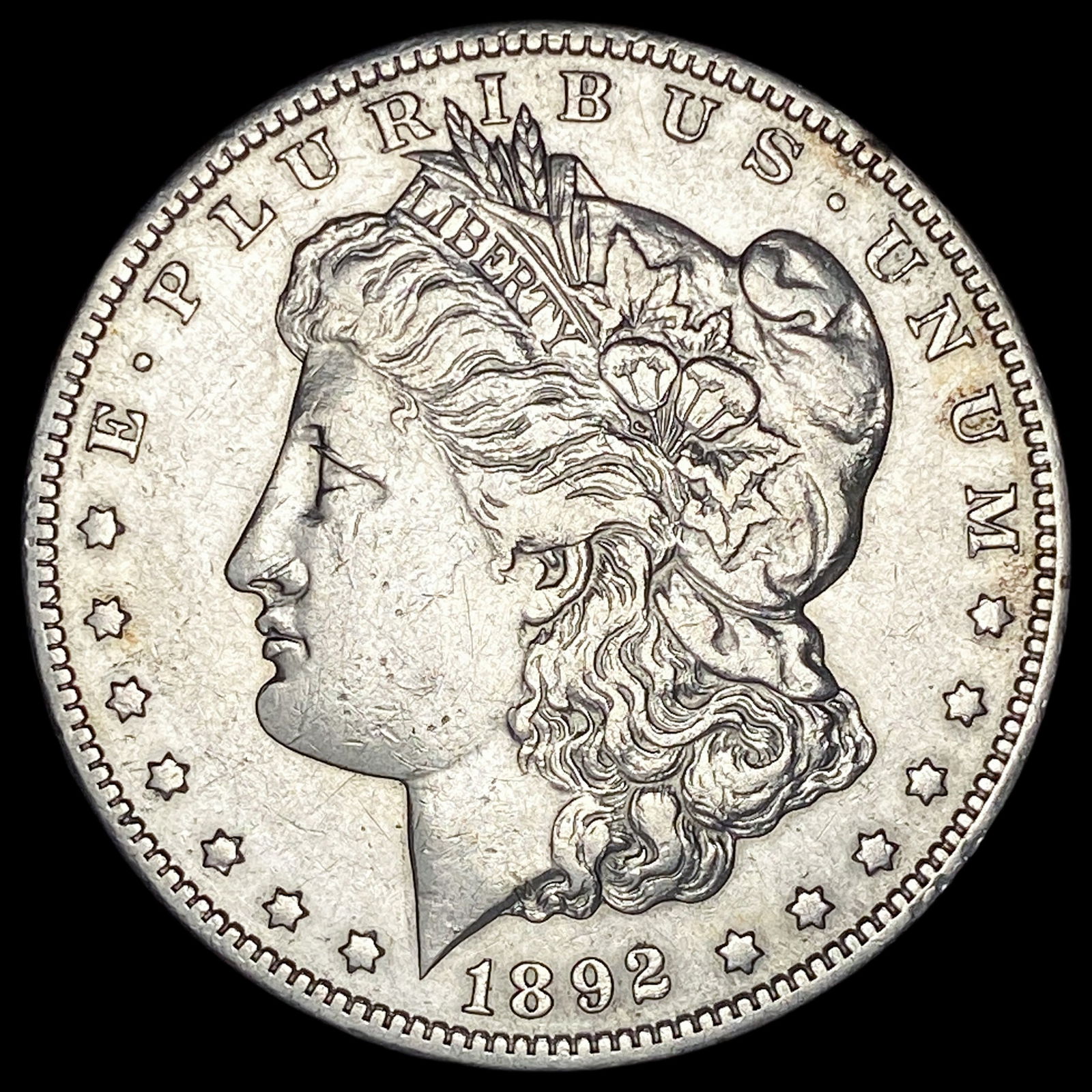 1892-S Silver Morgan Dollar NEARLY UNCIRCULATED (1 of 2)