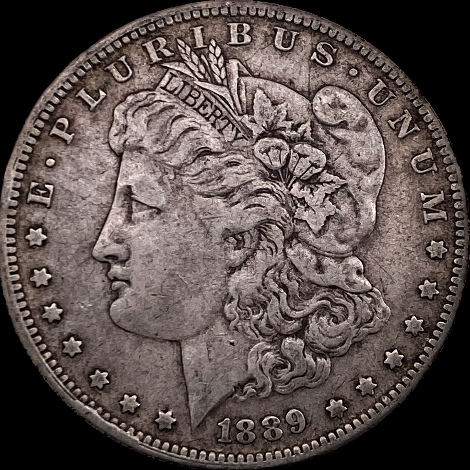 1889-O Silver Morgan Dollar NEARLY UNCIRCULATED (1 of 2)